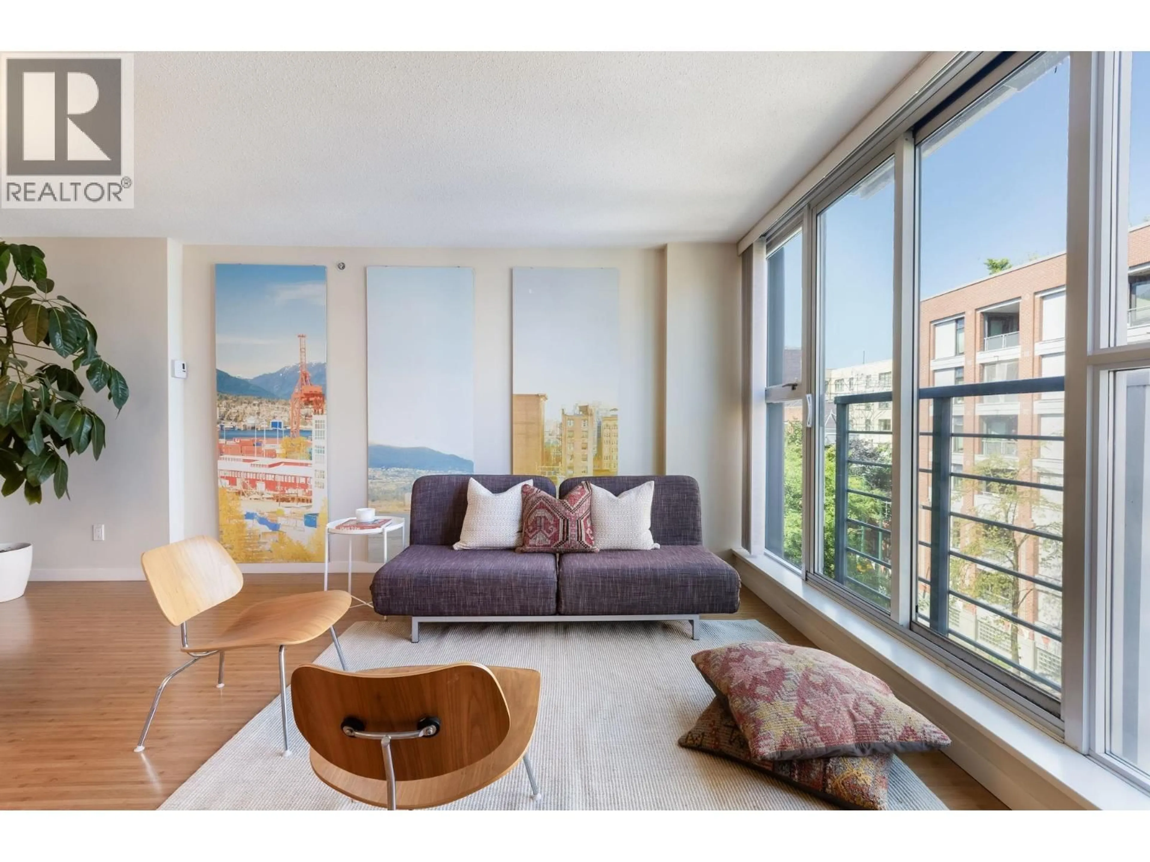 Living room with furniture, wood/laminate floor for 507 - 168 POWELL STREET, Vancouver British Columbia V6A0B2