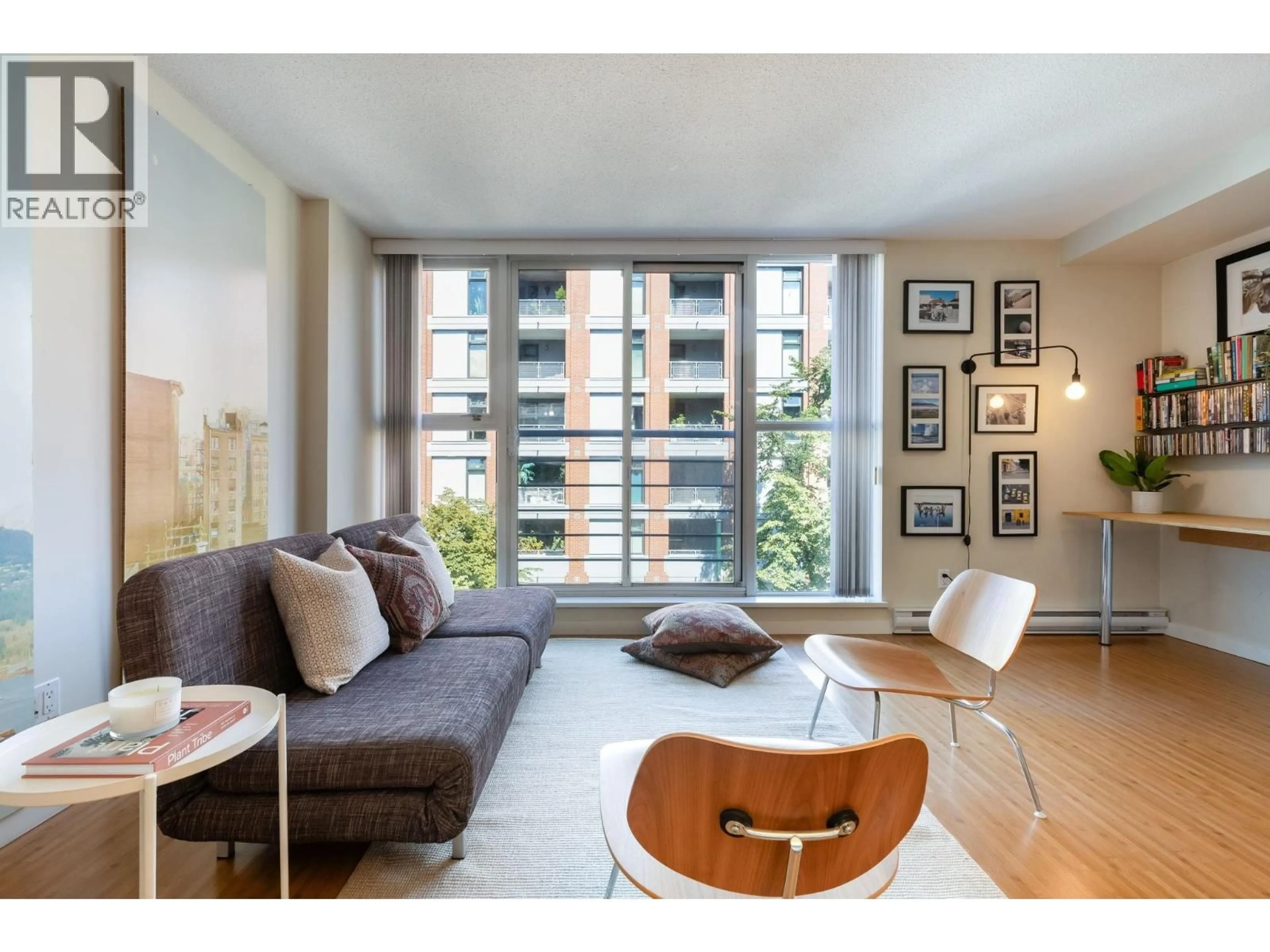 Living room with furniture, wood/laminate floor for 507 - 168 POWELL STREET, Vancouver British Columbia V6A0B2