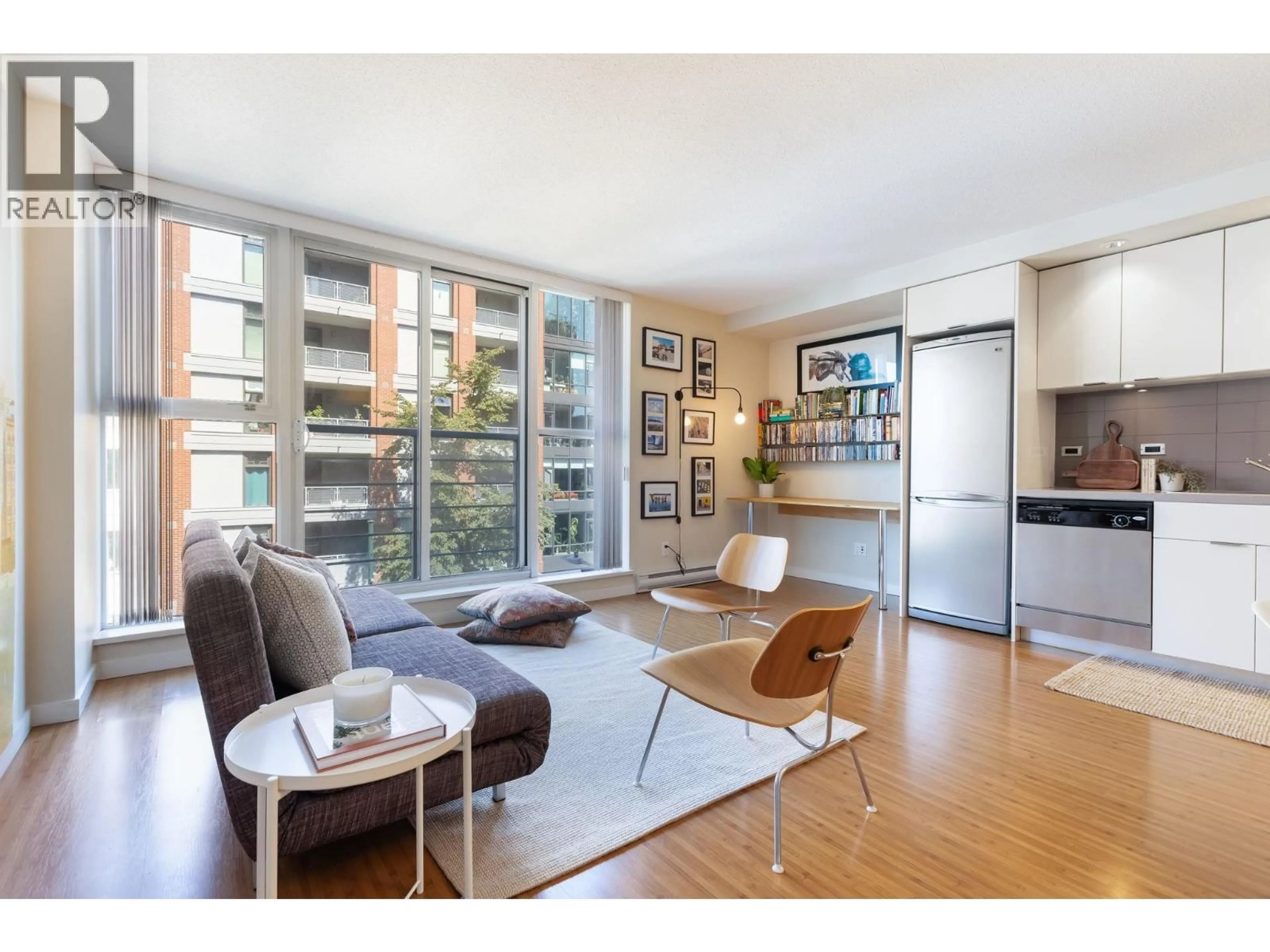 Living room with furniture, wood/laminate floor for 507 - 168 POWELL STREET, Vancouver British Columbia V6A0B2