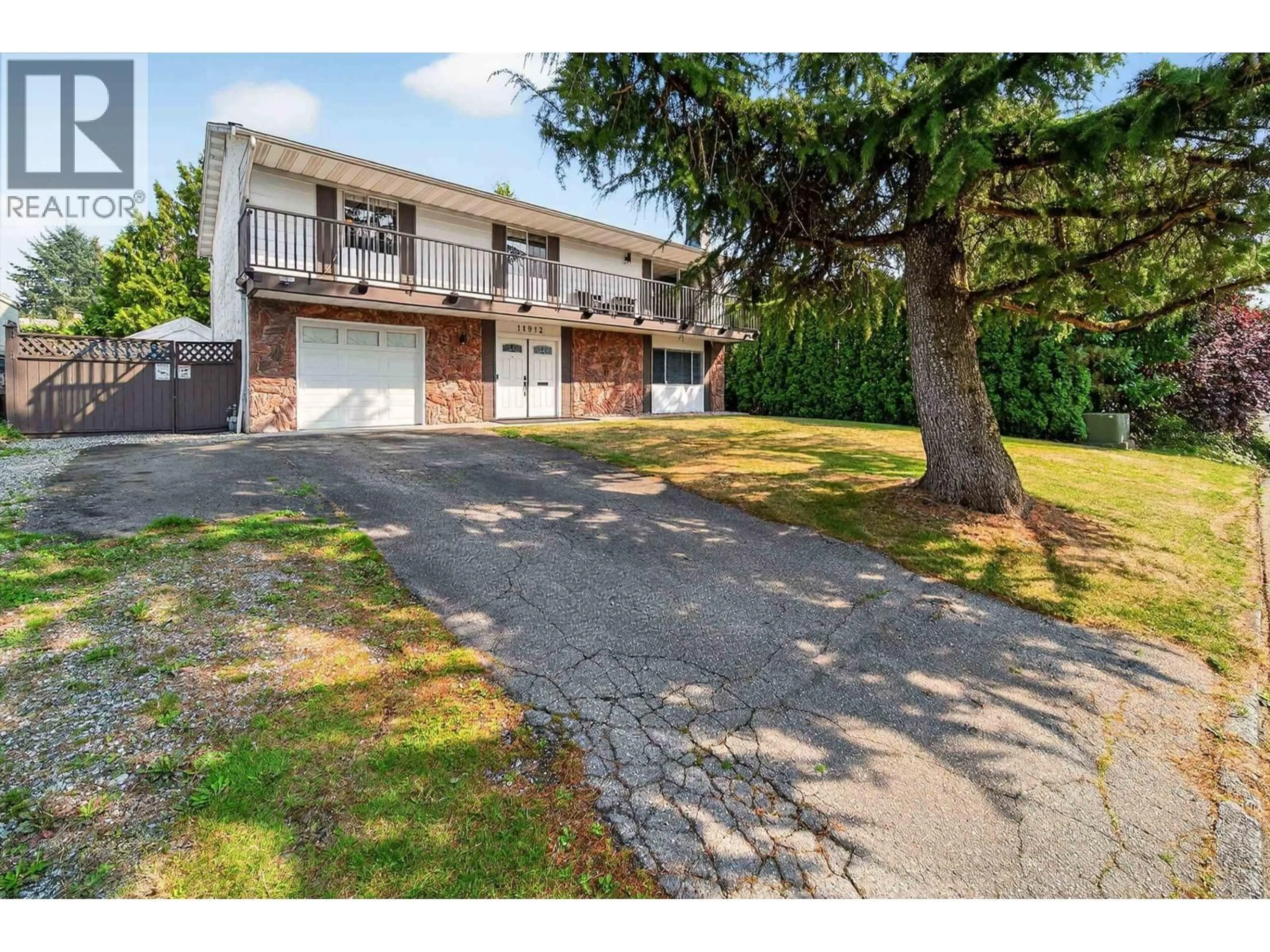A pic from outside/outdoor area/front of a property/back of a property/a pic from drone, street for 11912 229 STREET, Maple Ridge British Columbia V2X6P8