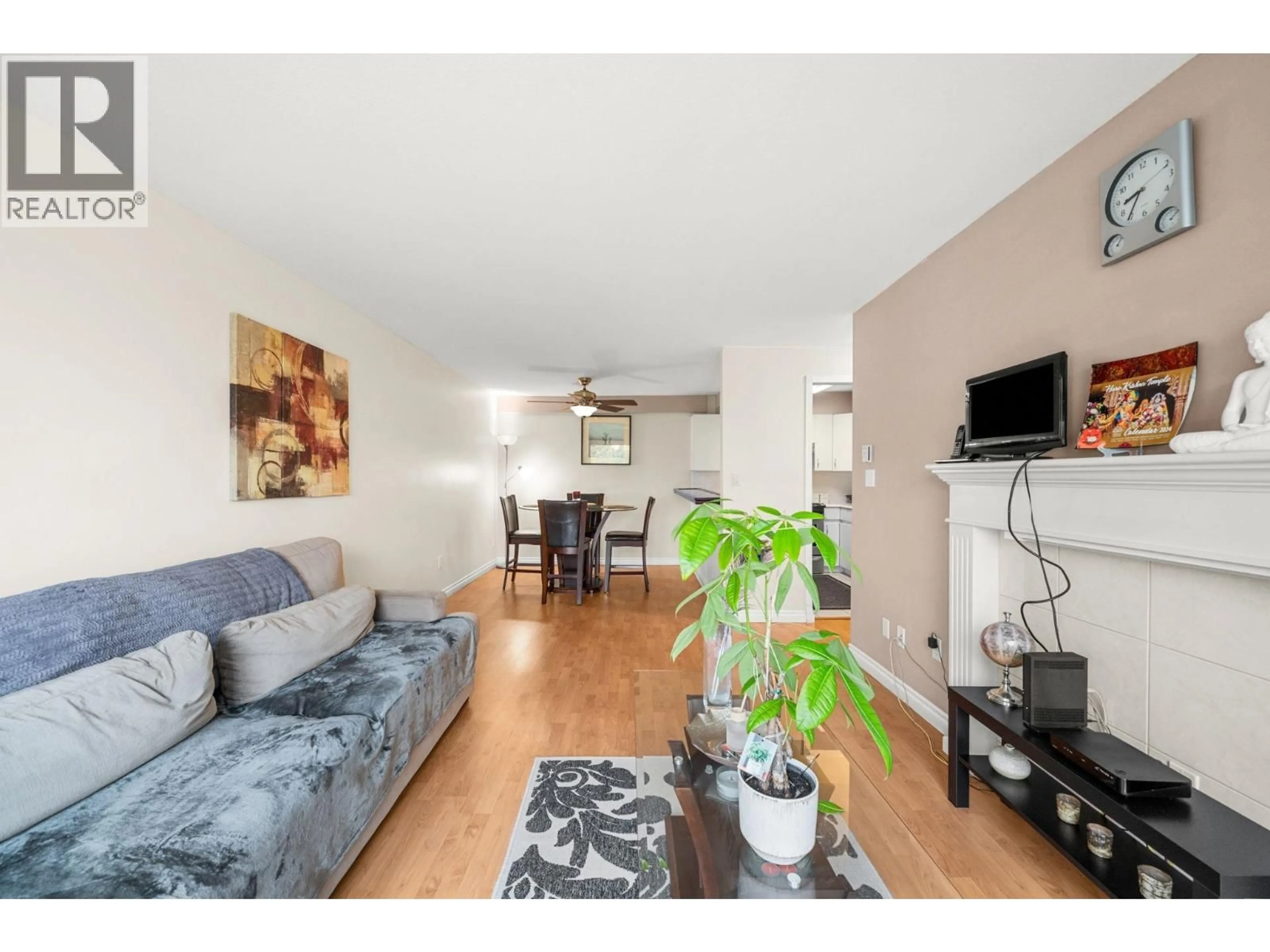 Living room with furniture, wood/laminate floor for 330 - 7480 ST. ALBANS ROAD, Richmond British Columbia V6Y2K6