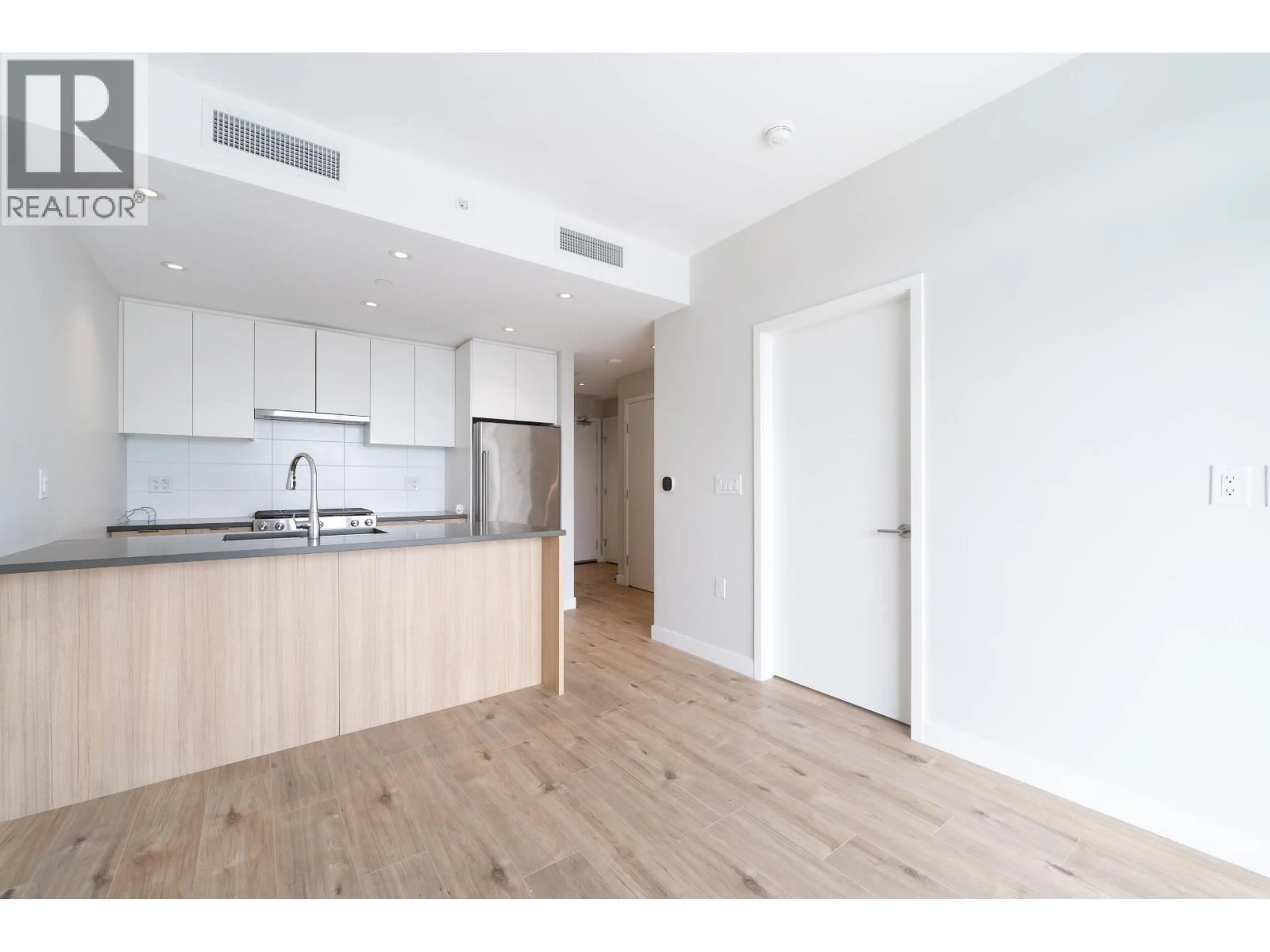 Standard kitchen, wood/laminate floor for 324 - 3430 KENT AVENUE, Vancouver British Columbia V5S0G7