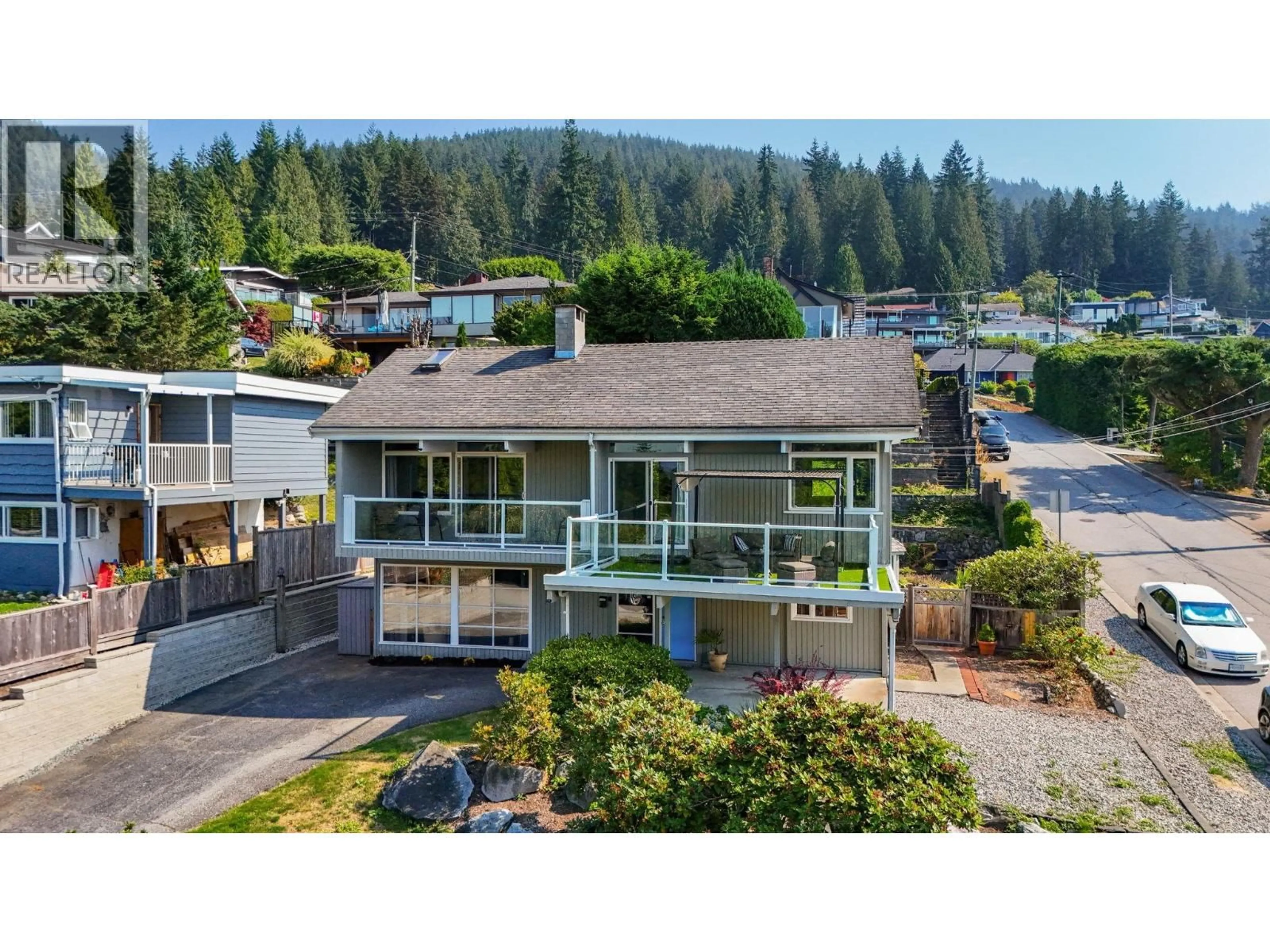 A pic from outside/outdoor area/front of a property/back of a property/a pic from drone, mountain view for 442 MONTERAY AVENUE, North Vancouver British Columbia V7N3G2