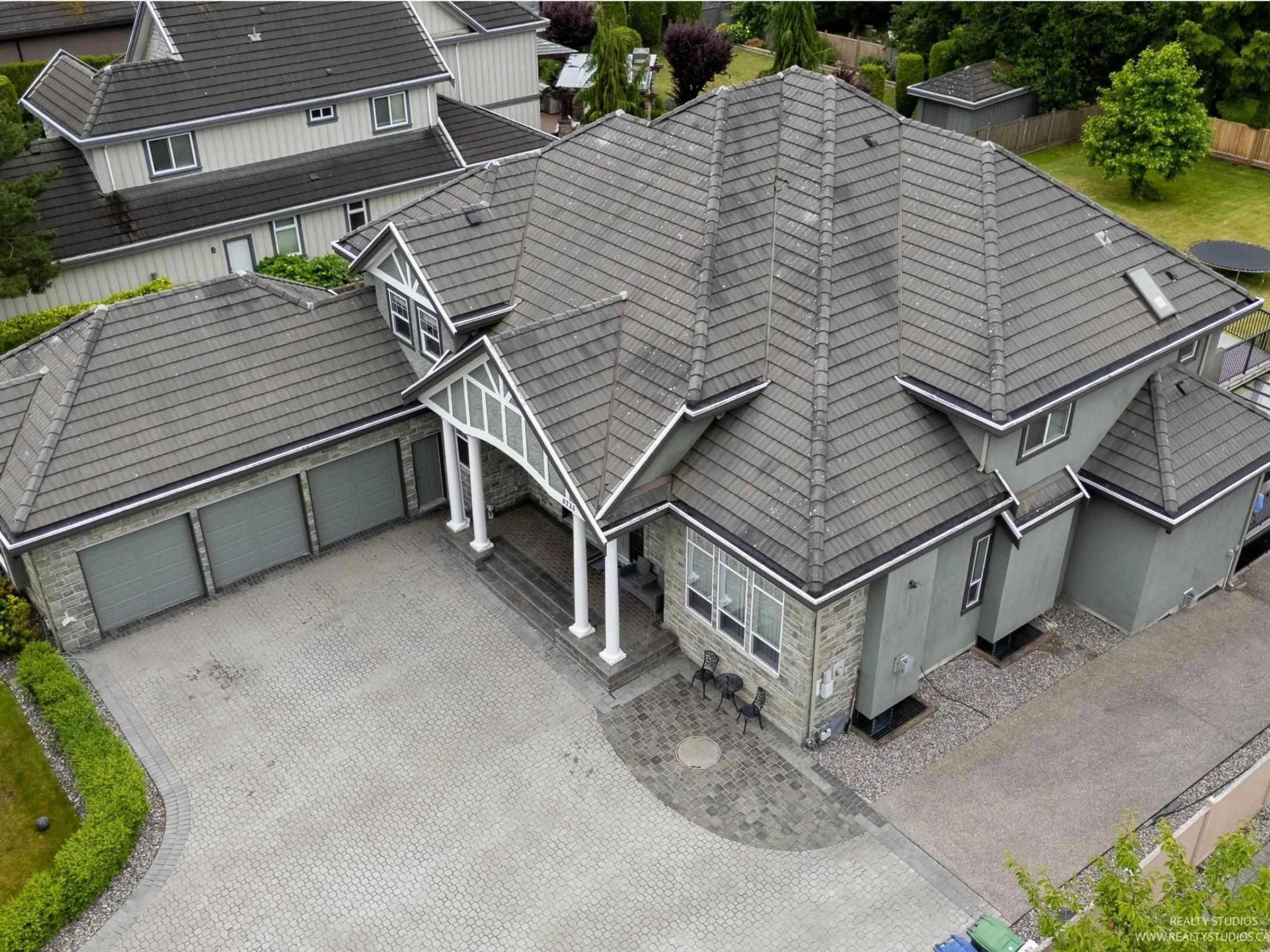 A pic from outside/outdoor area/front of a property/back of a property/a pic from drone, building for 5733 136B, Surrey British Columbia V3X3N9