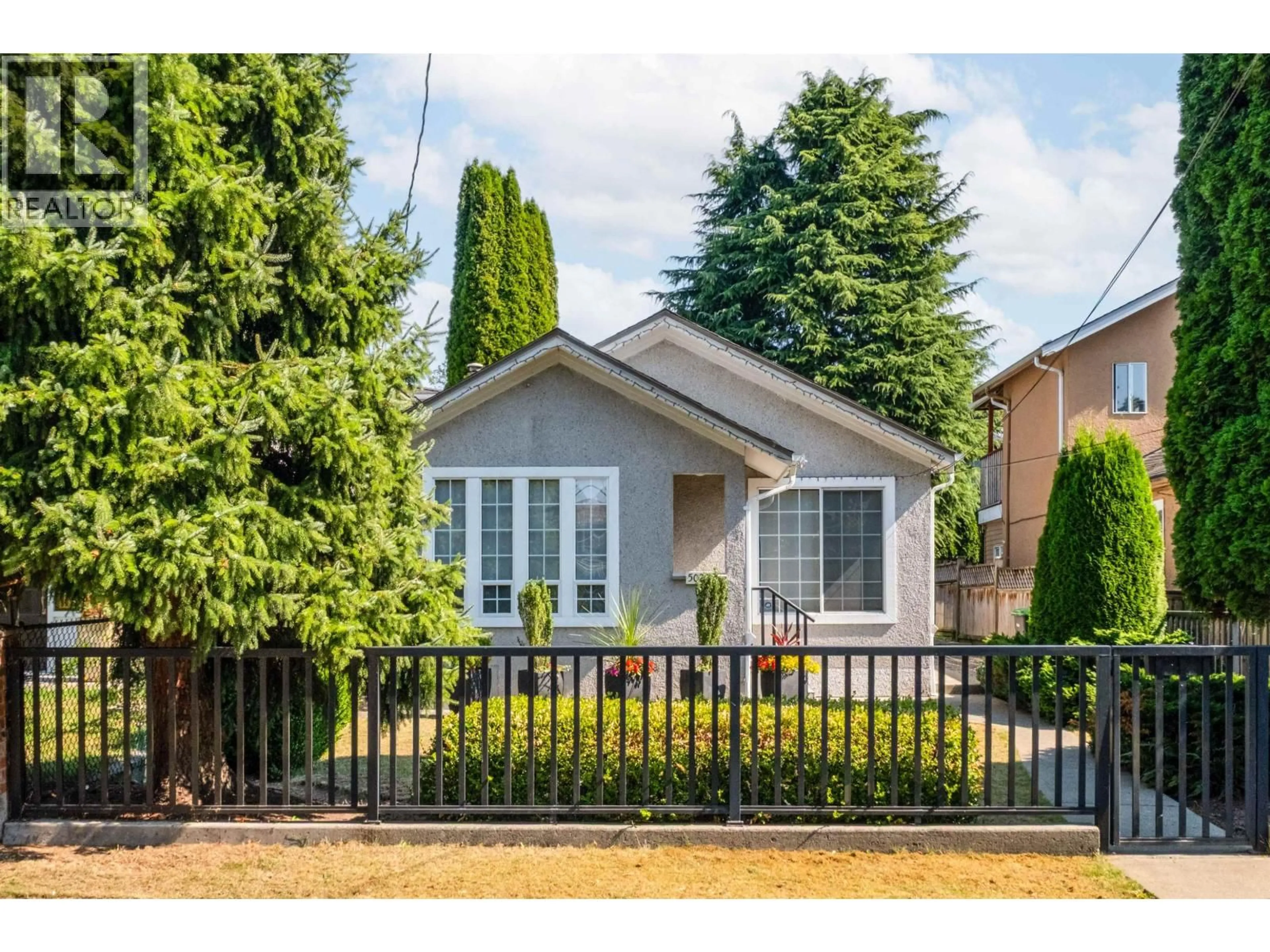 Home with vinyl exterior material, street for 5020 MOSS STREET, Vancouver British Columbia V5R3T7