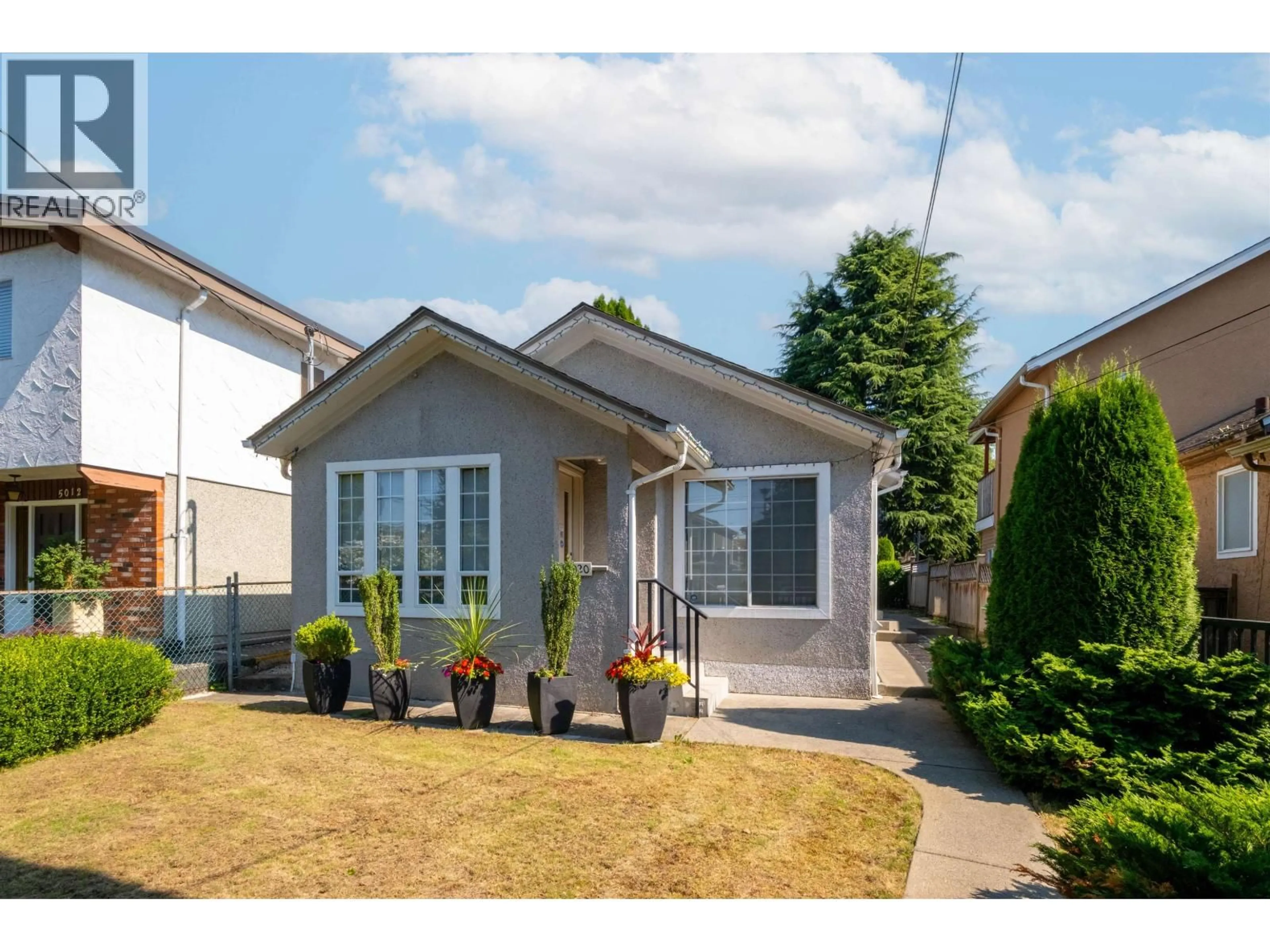 Home with vinyl exterior material, street for 5020 MOSS STREET, Vancouver British Columbia V5R3T7