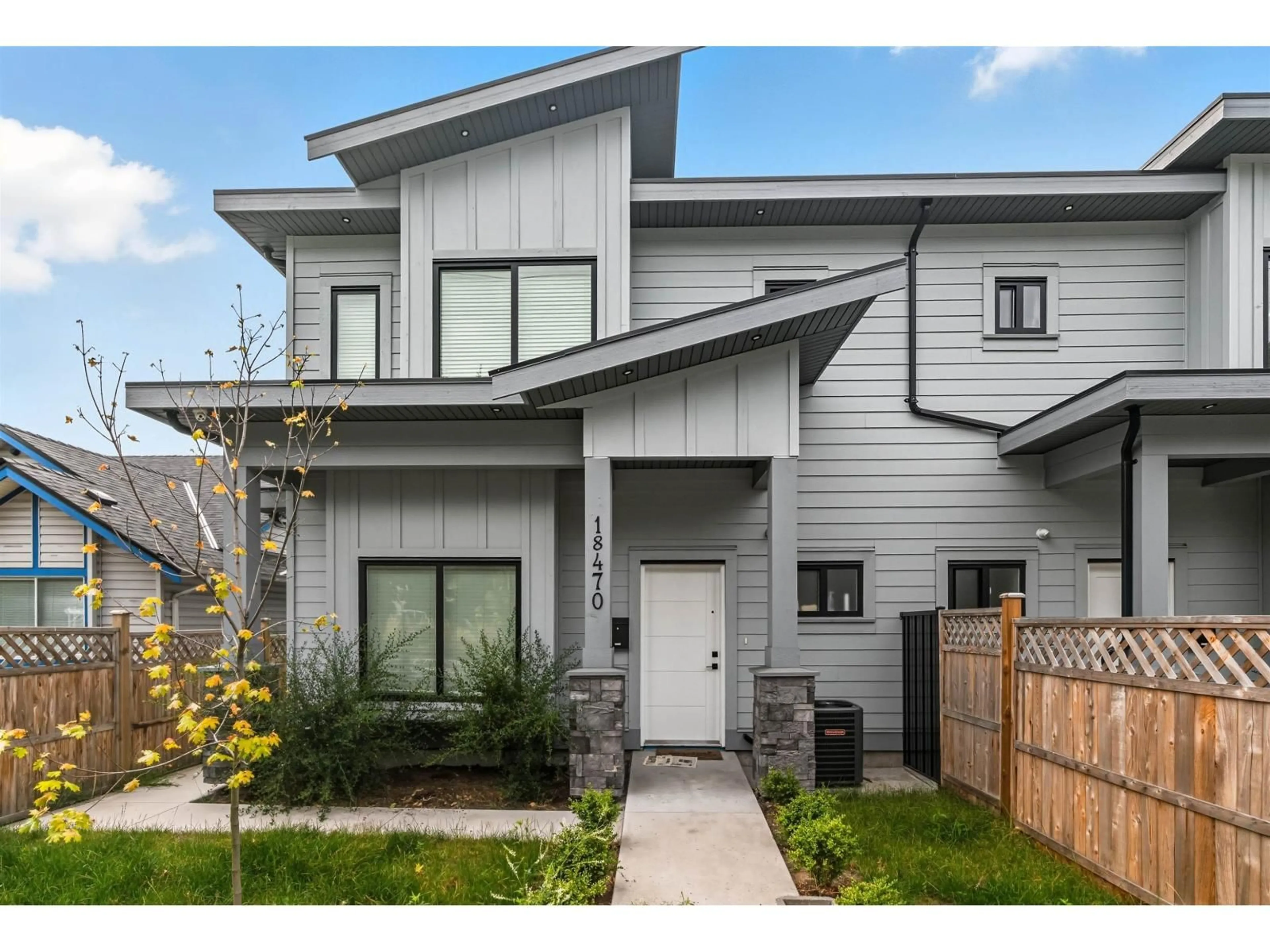 Home with vinyl exterior material, street for 18470 64, Surrey British Columbia V3S8J6