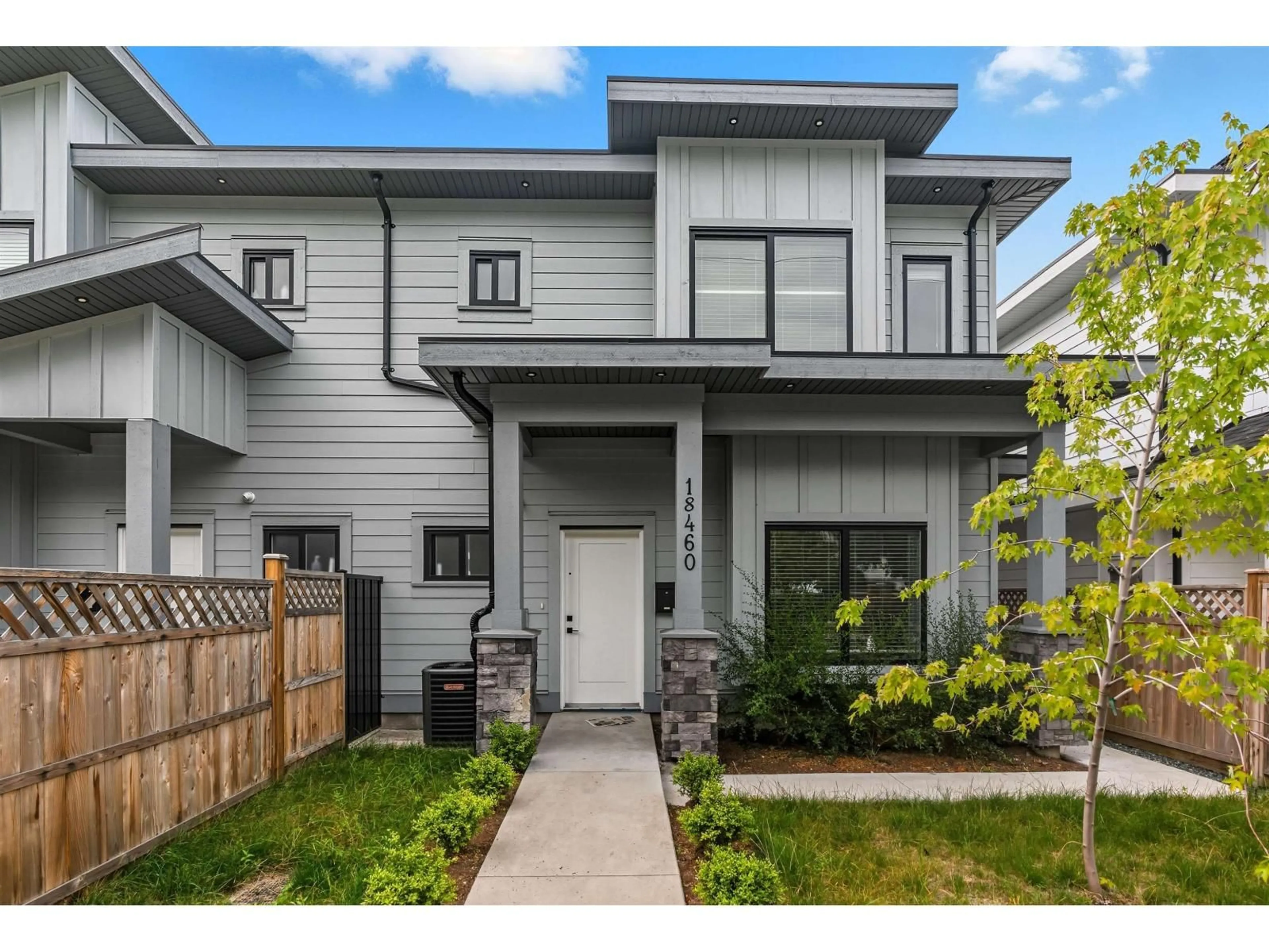 Home with vinyl exterior material, street for 18460 64, Surrey British Columbia V3S8J6