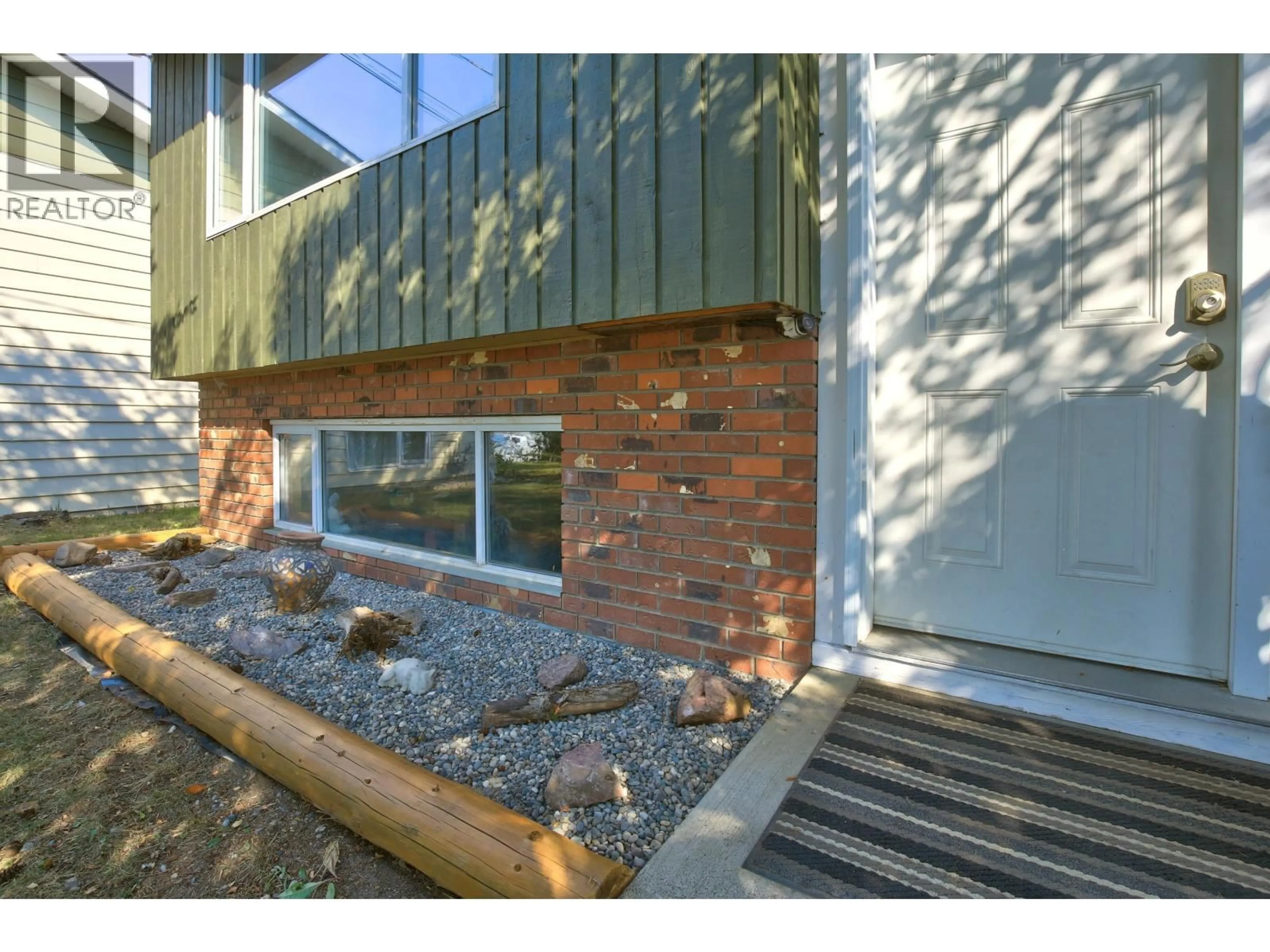 Home with brick exterior material, street for 1510 12TH AVENUE, Williams Lake British Columbia V2G3X4