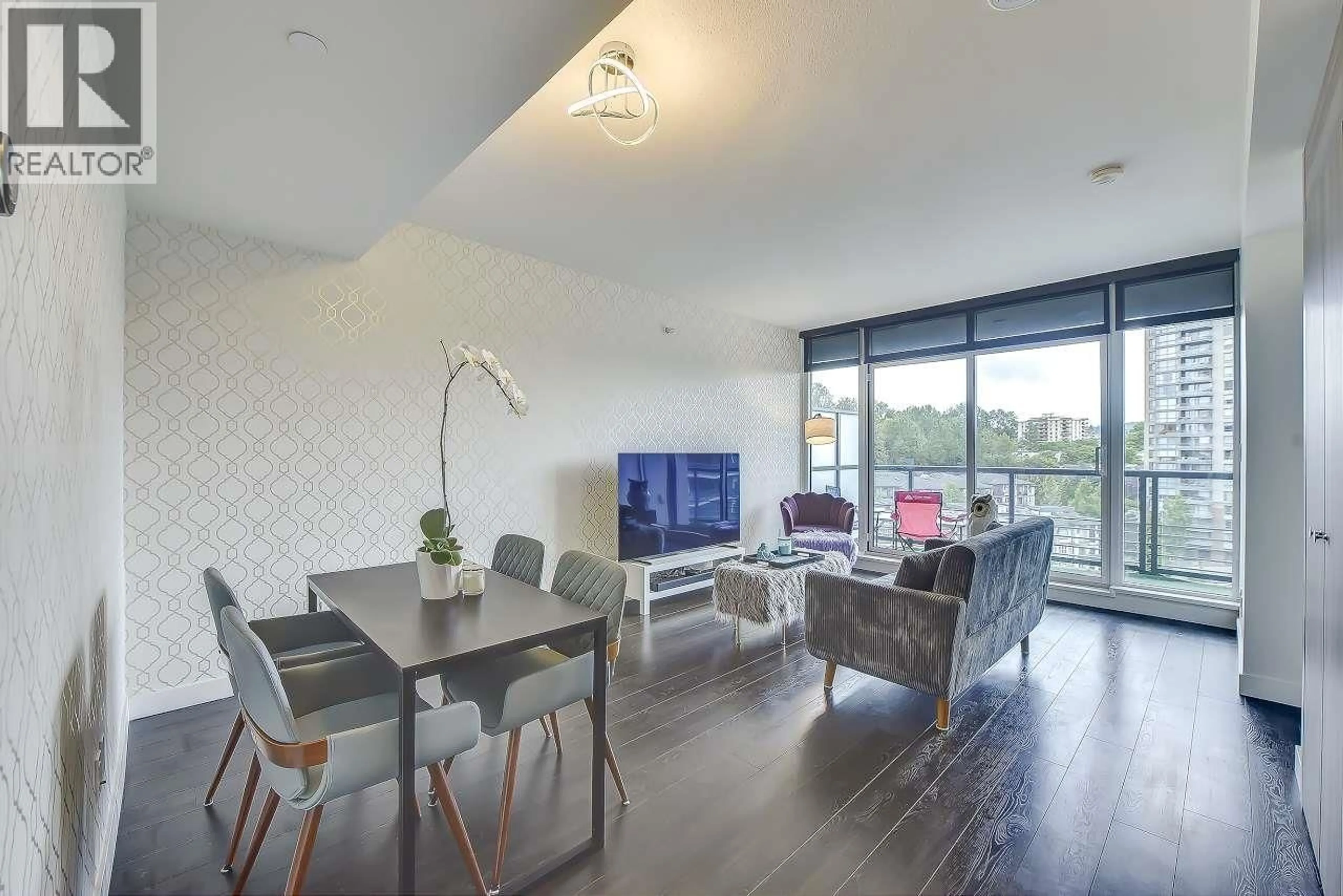 Living room with furniture, wood/laminate floor for 1010 - 4730 LOUGHEED HIGHWAY, Burnaby British Columbia V5C0M9