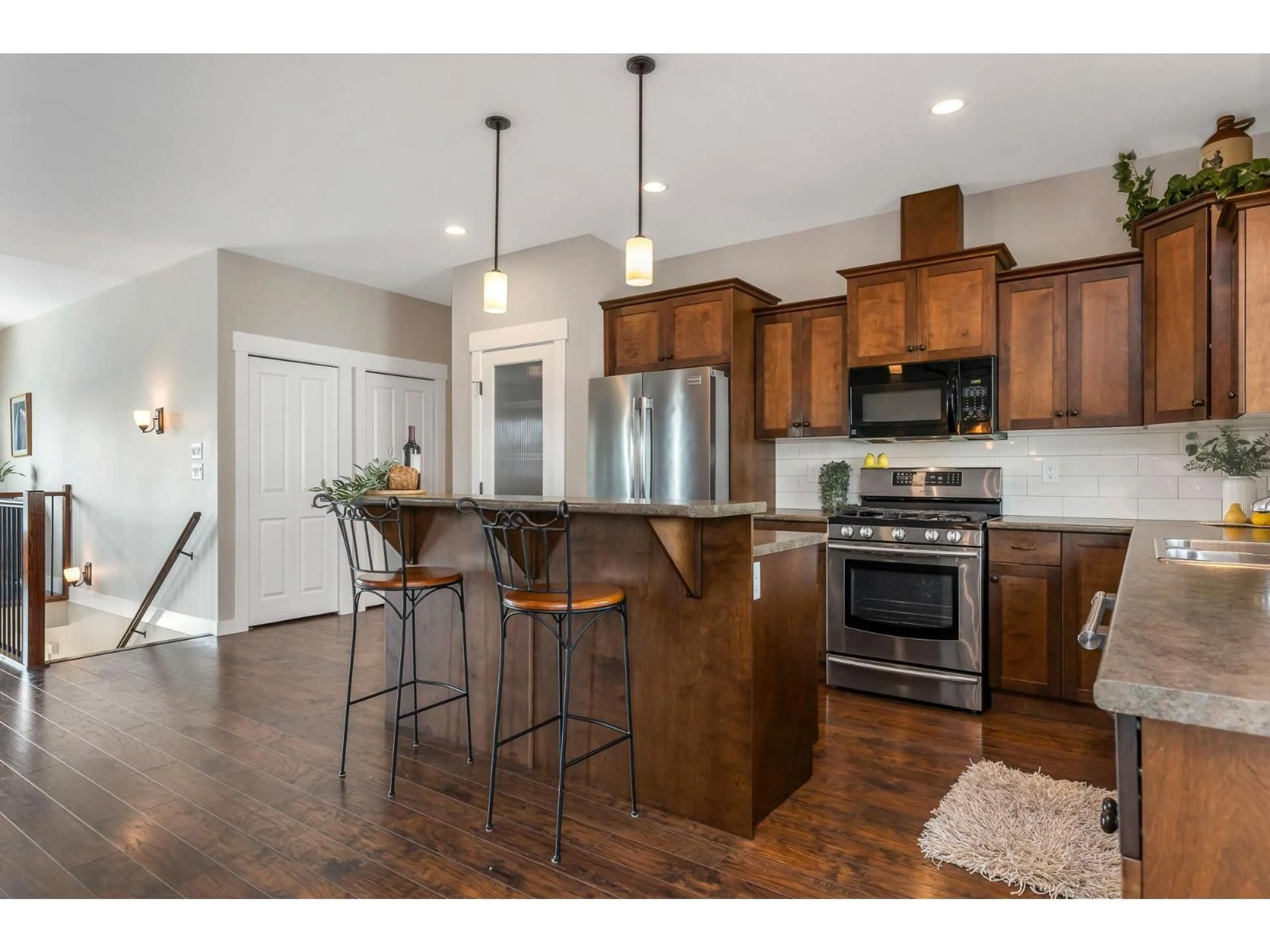Open concept kitchen, wood/laminate floor for 7148 ROCHESTER AVENUE, Chilliwack British Columbia V2R2P3