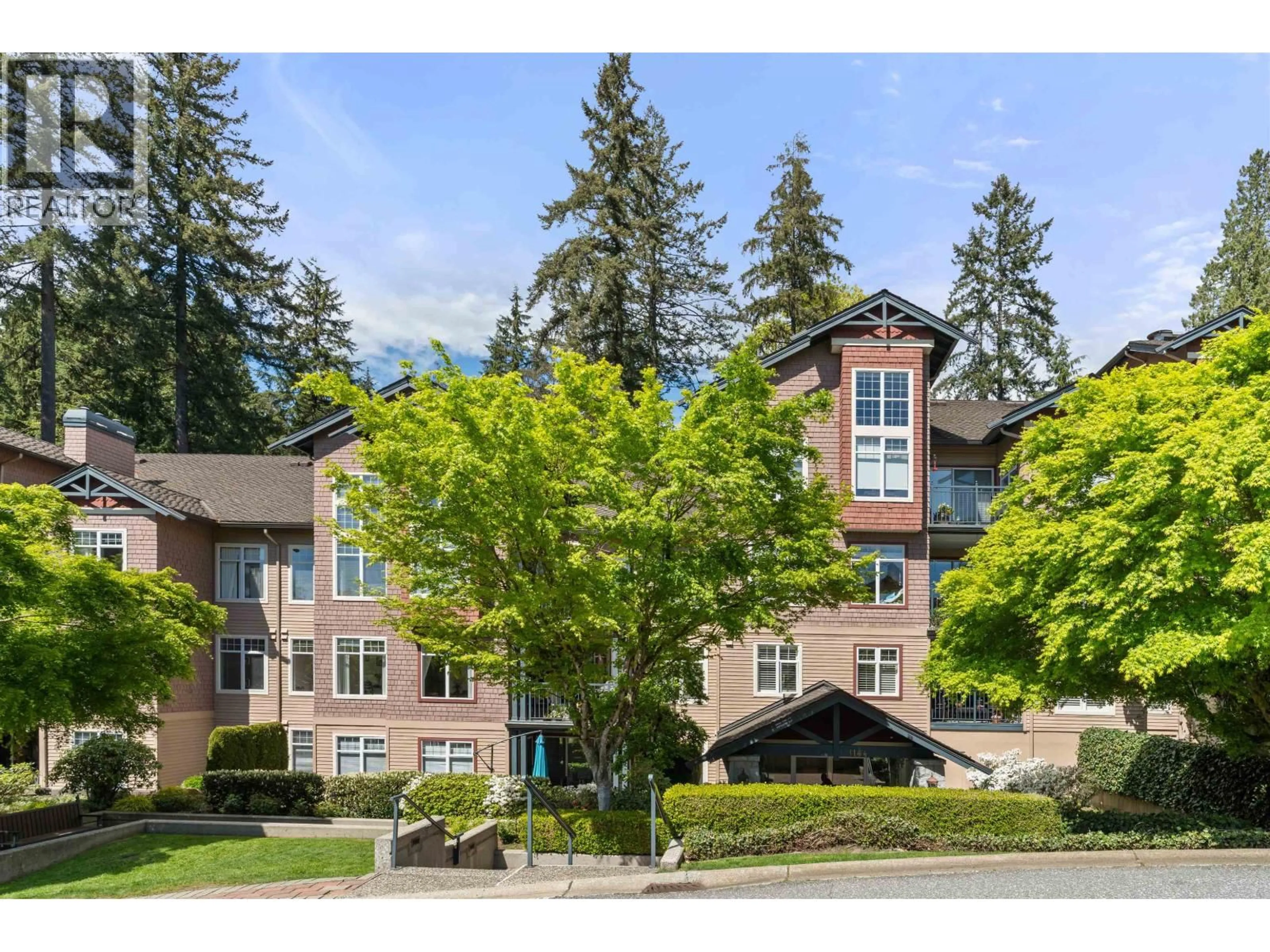 A pic from outside/outdoor area/front of a property/back of a property/a pic from drone, mountain view for 103 - 1144 STRATHAVEN DRIVE, North Vancouver British Columbia V7H2Z6