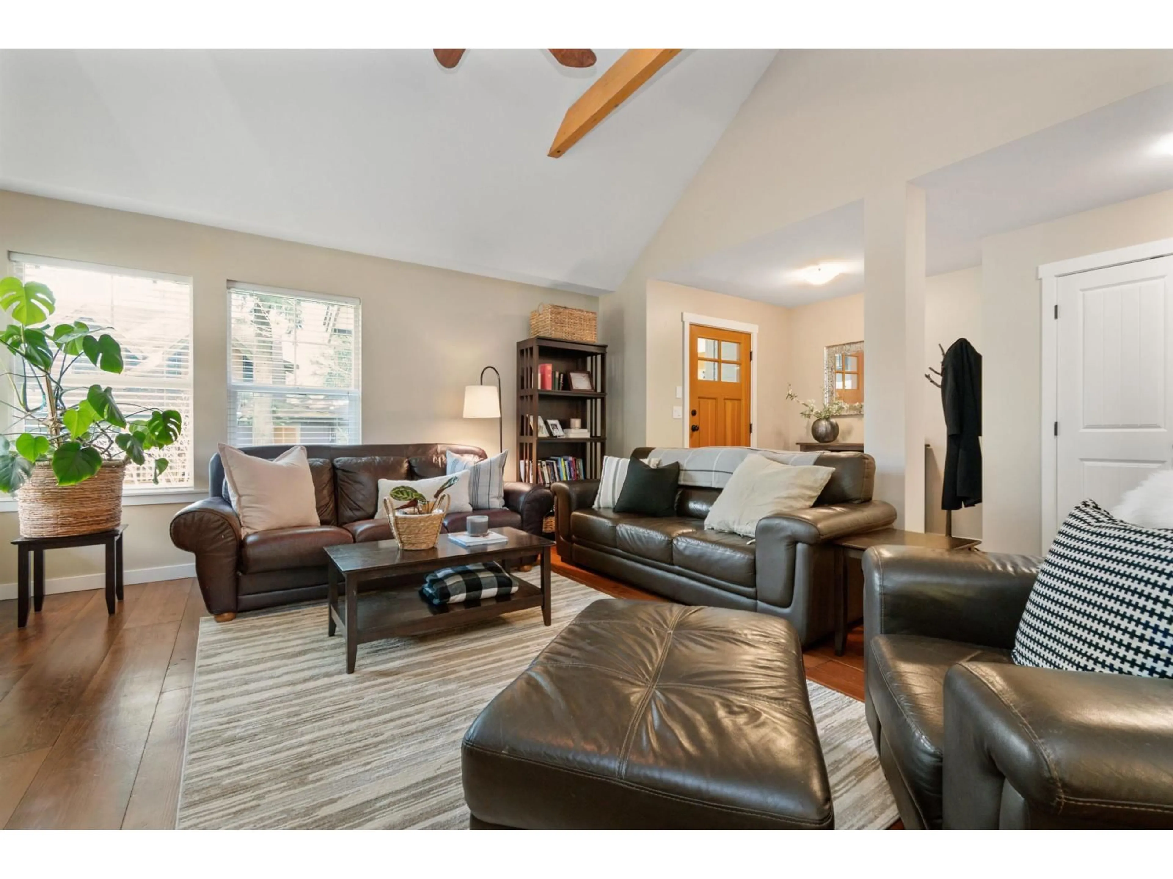 Living room with furniture, wood/laminate floor for 1829 MOSSY GREEN WAY, Lindell Beach British Columbia V2R0E1