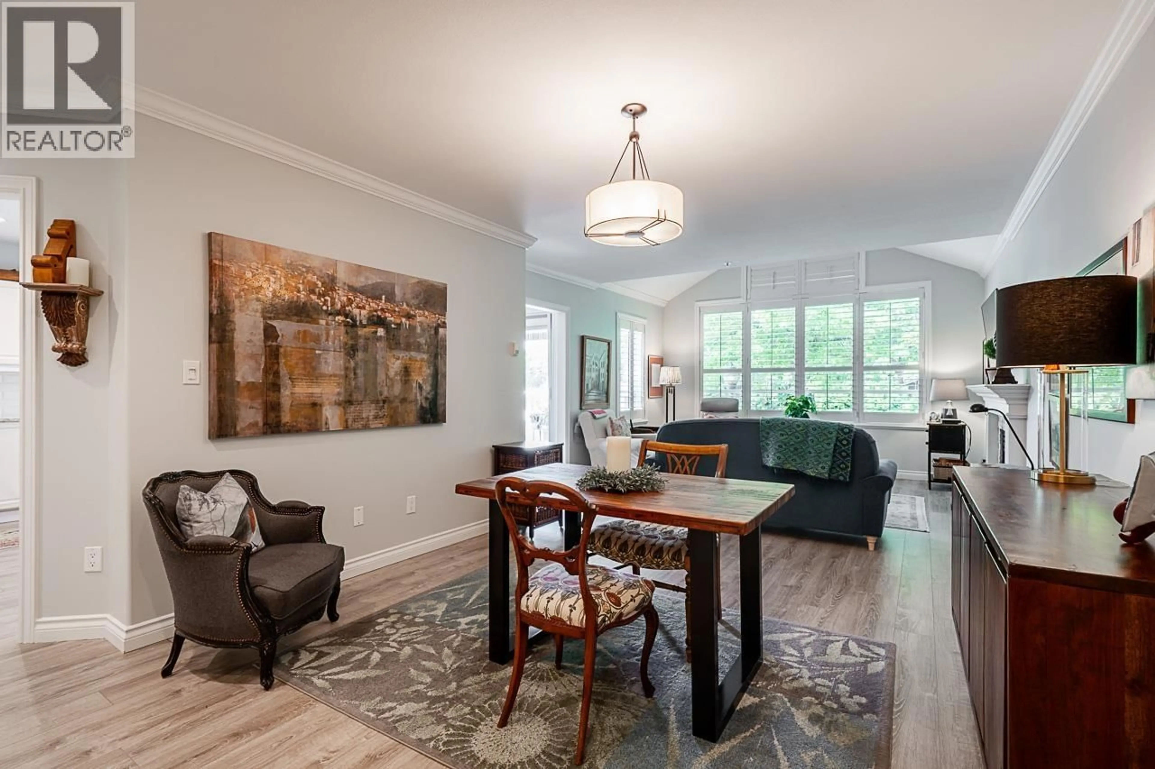 Living room with furniture, wood/laminate floor for 201 - 1250 55 STREET, Delta British Columbia V4M3K3