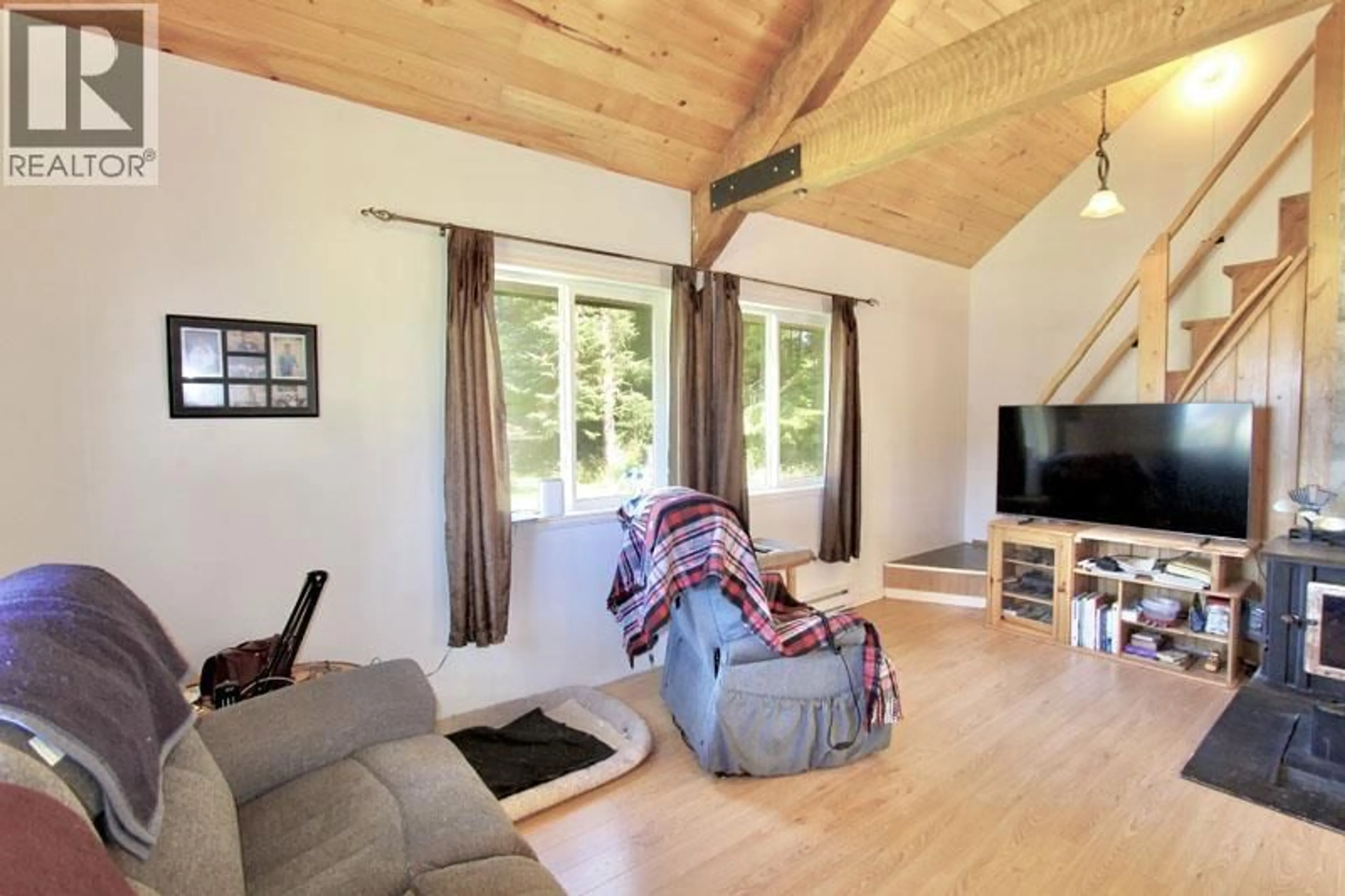 Living room with furniture, wood/laminate floor for 1514 BURGESS AVENUE, Masset British Columbia V0T1M0