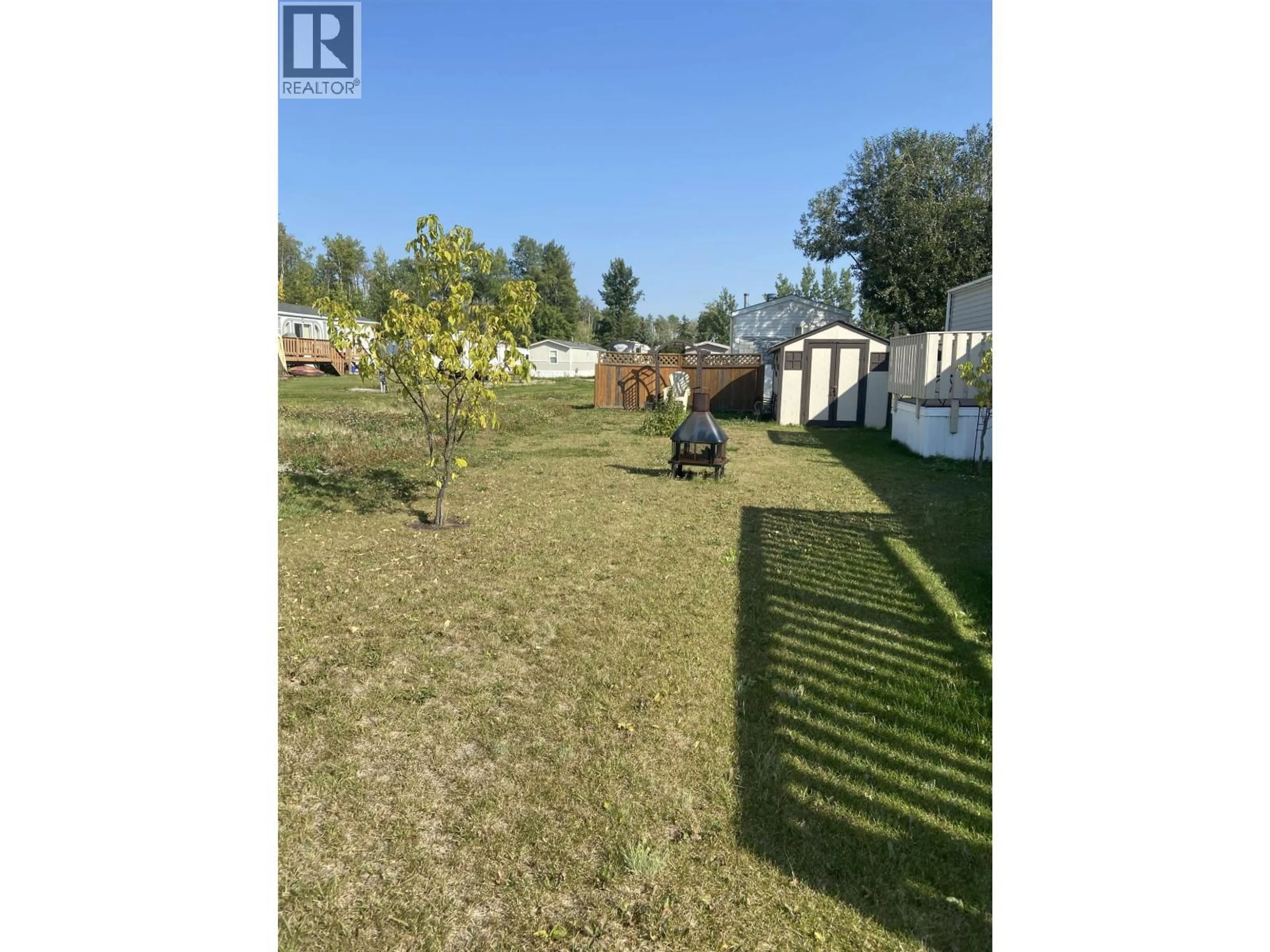 A pic from outside/outdoor area/front of a property/back of a property/a pic from drone, forest/trees view for 60 - 7414 FOREST LAWN STREET, Fort St. John British Columbia V1J4H8