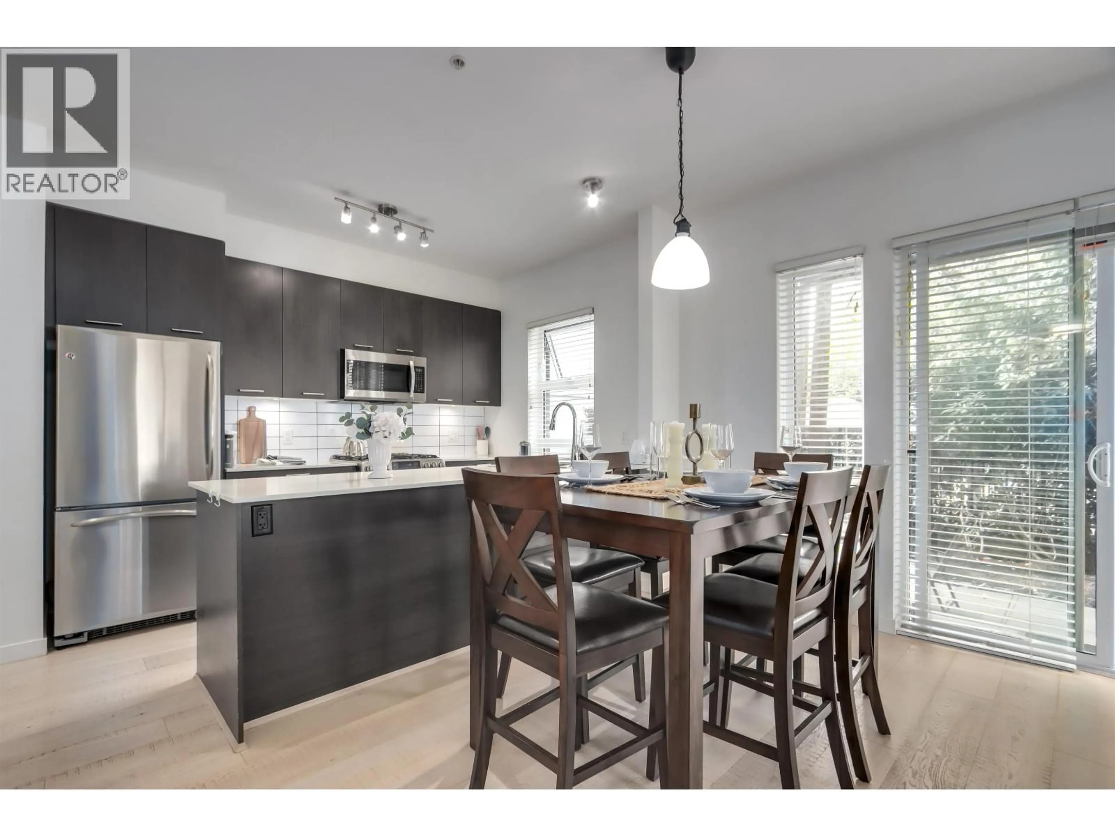 Open concept kitchen, wood/laminate floor for 105 - 245 BROOKES STREET, New Westminster British Columbia V3M0G5