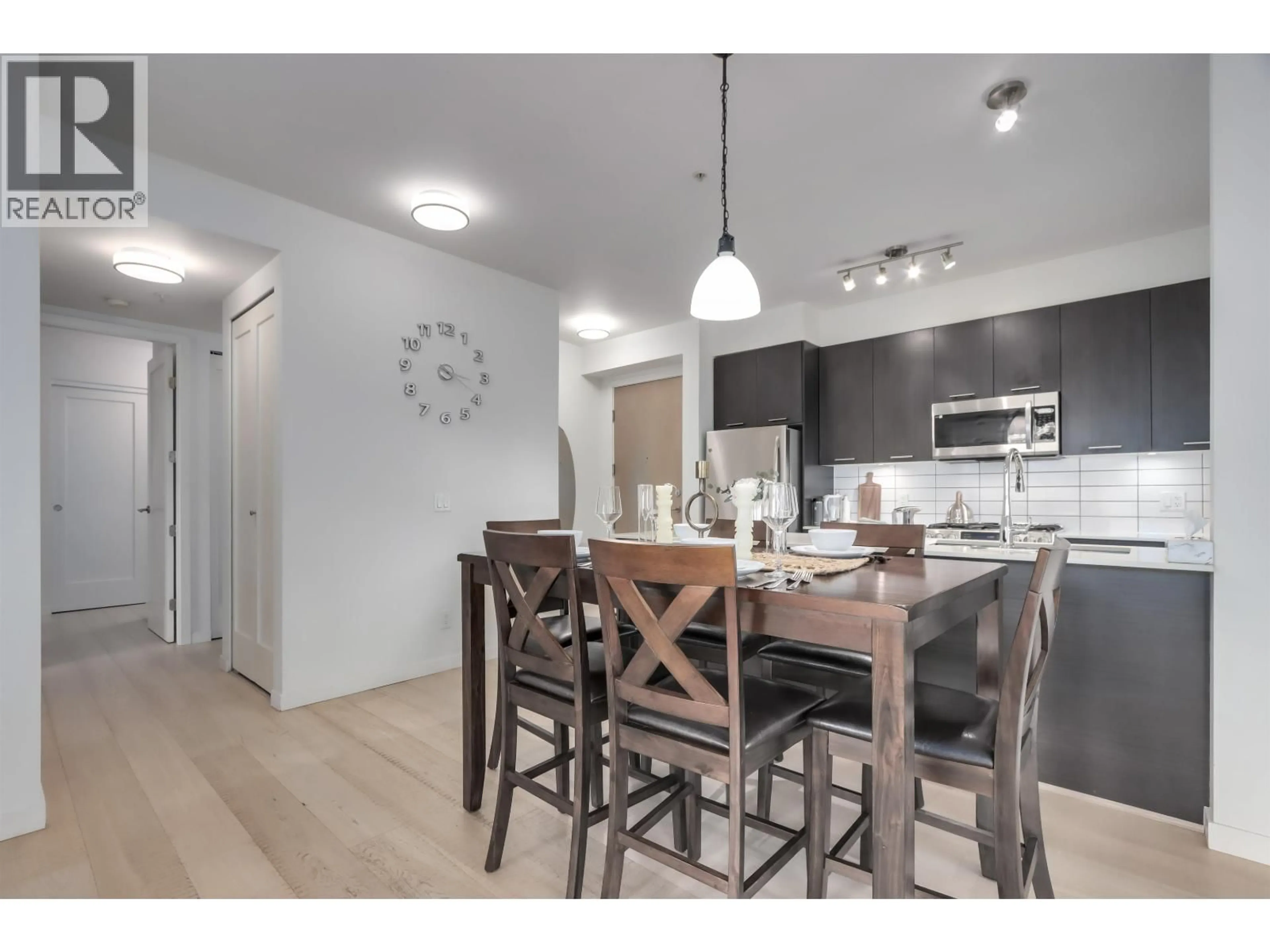 Open concept kitchen, wood/laminate floor for 105 - 245 BROOKES STREET, New Westminster British Columbia V3M0G5
