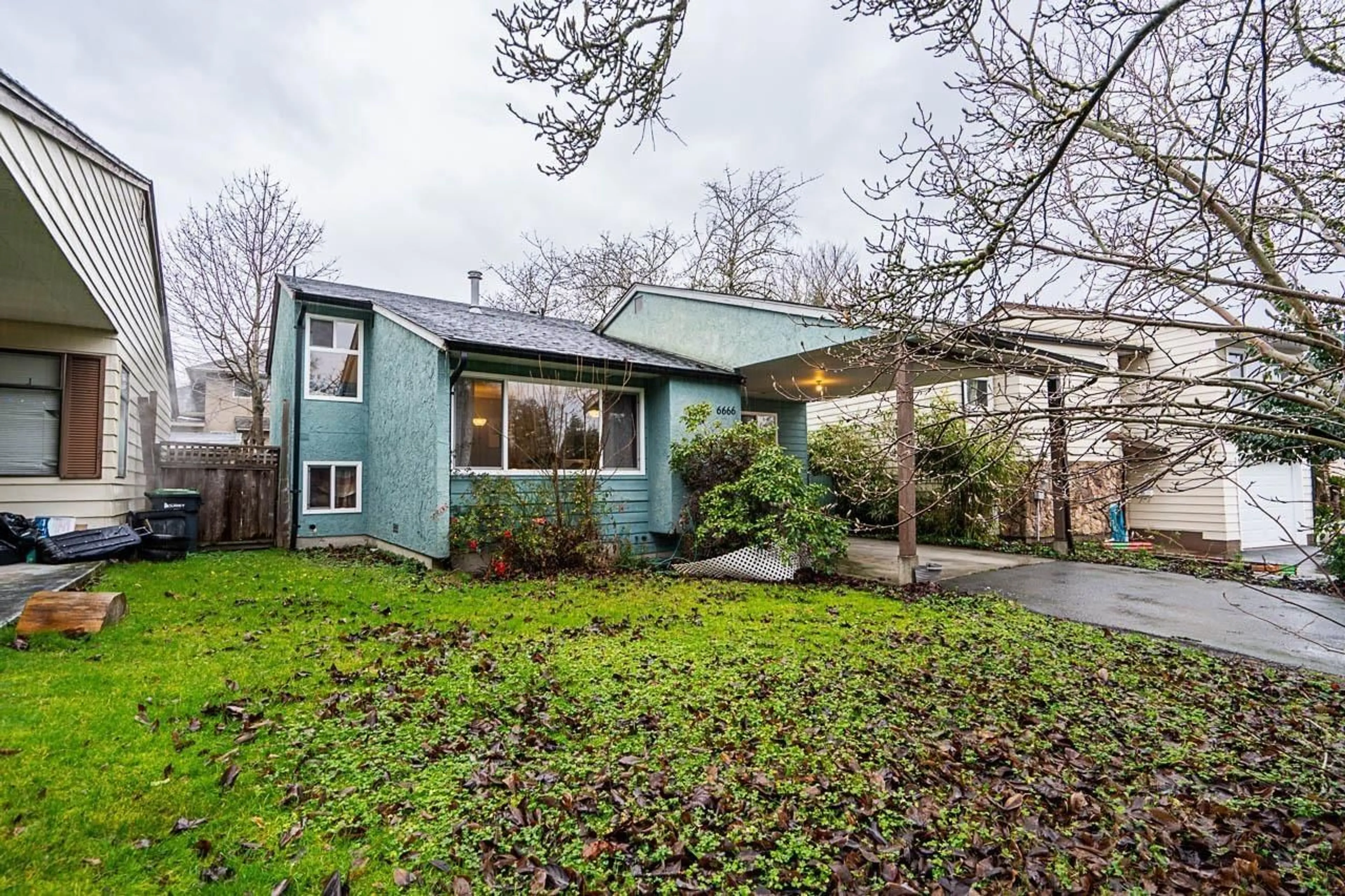 Home with vinyl exterior material, street for 6666 133B, Surrey British Columbia V3W7E9