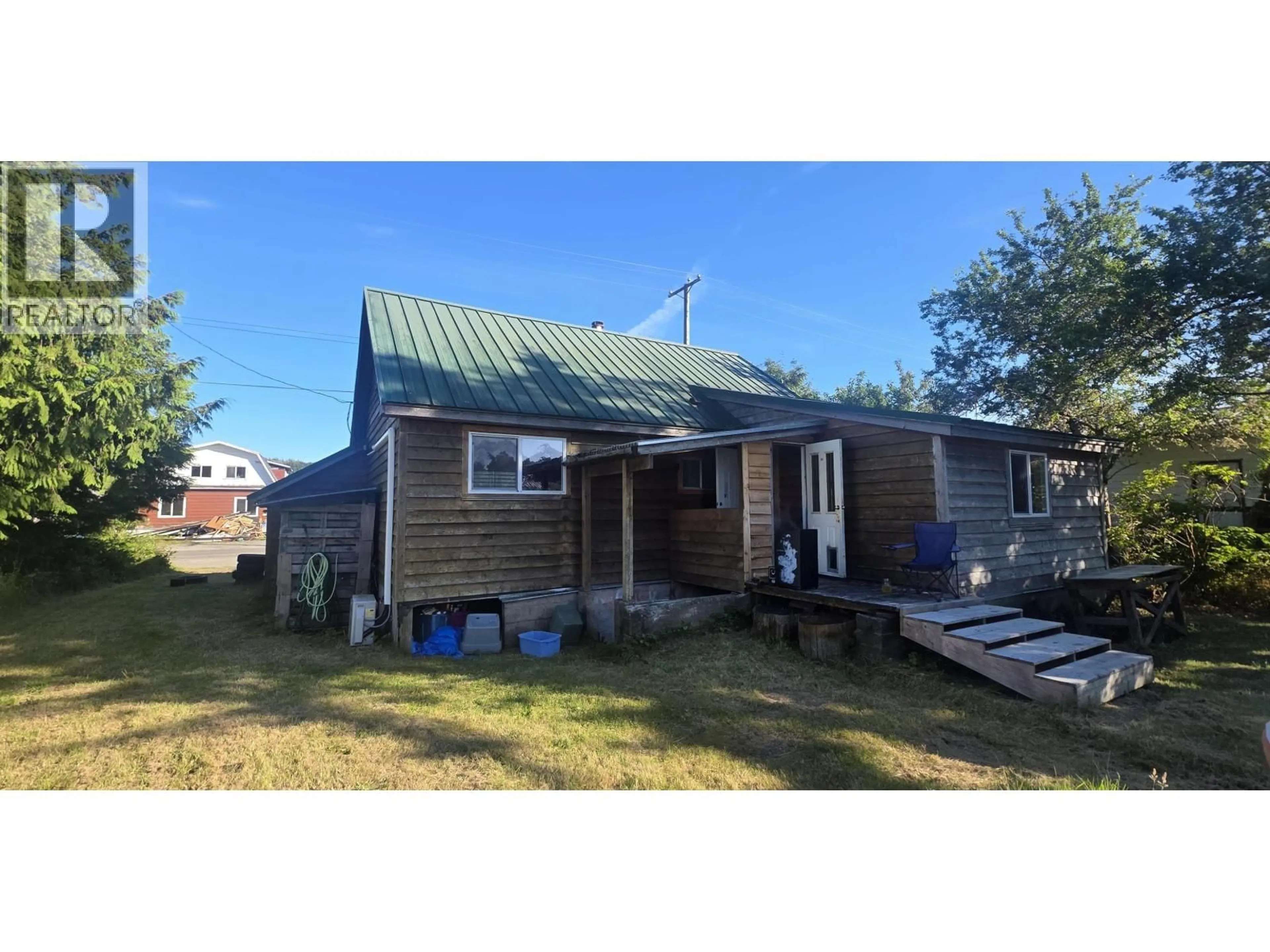 A pic from outside/outdoor area/front of a property/back of a property/a pic from drone, building for 1567 DELKATLA STREET, Masset British Columbia V0T1M0
