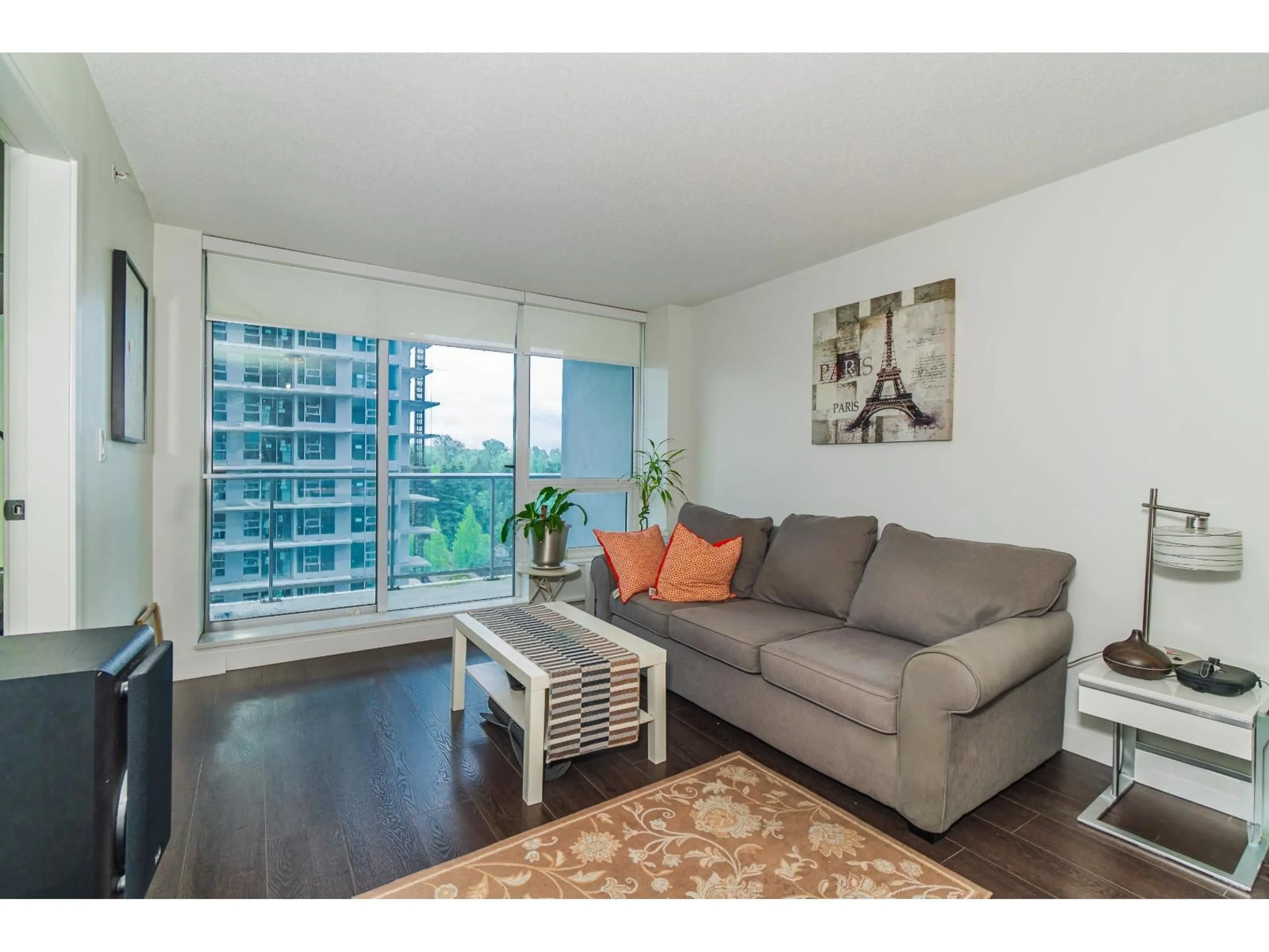 Living room with furniture, wood/laminate floor for 1915 - 13750 100, Surrey British Columbia V3T0L3