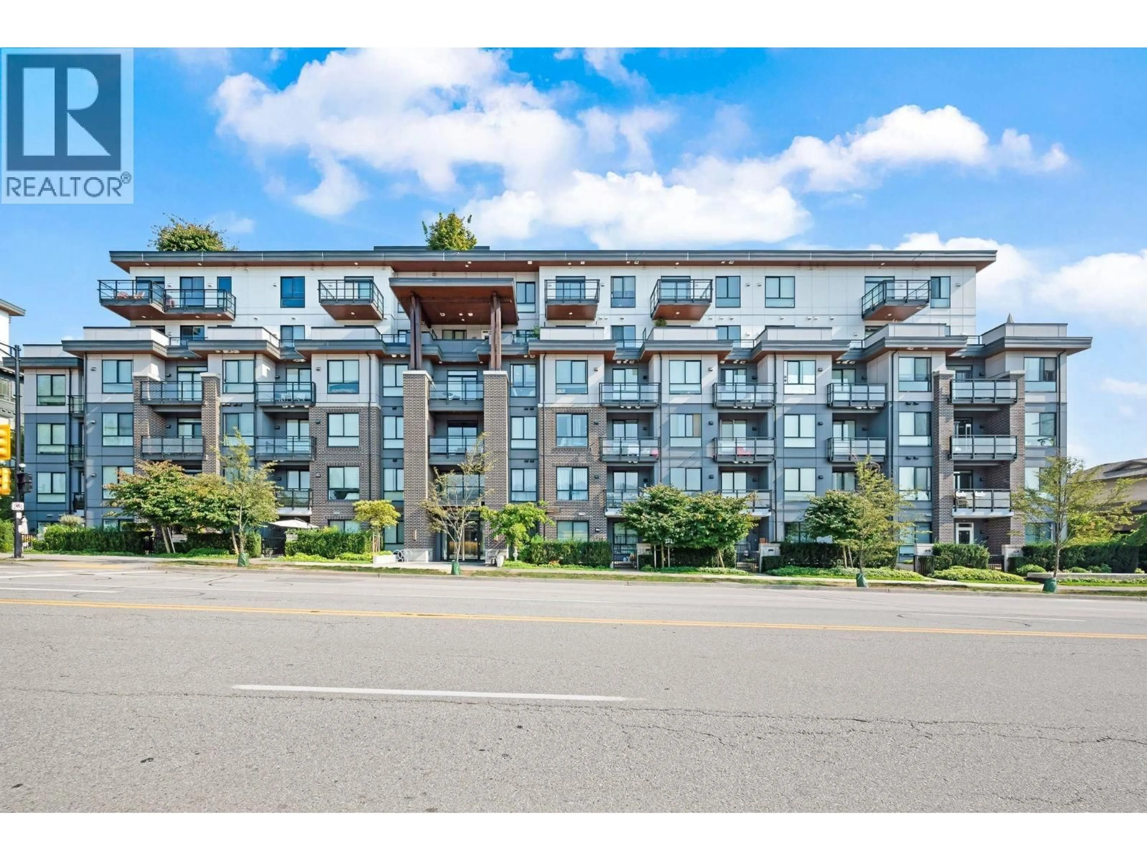 A pic from outside/outdoor area/front of a property/back of a property/a pic from drone, unknown for 102 - 700 CLARKE ROAD, Coquitlam British Columbia V3J0K5