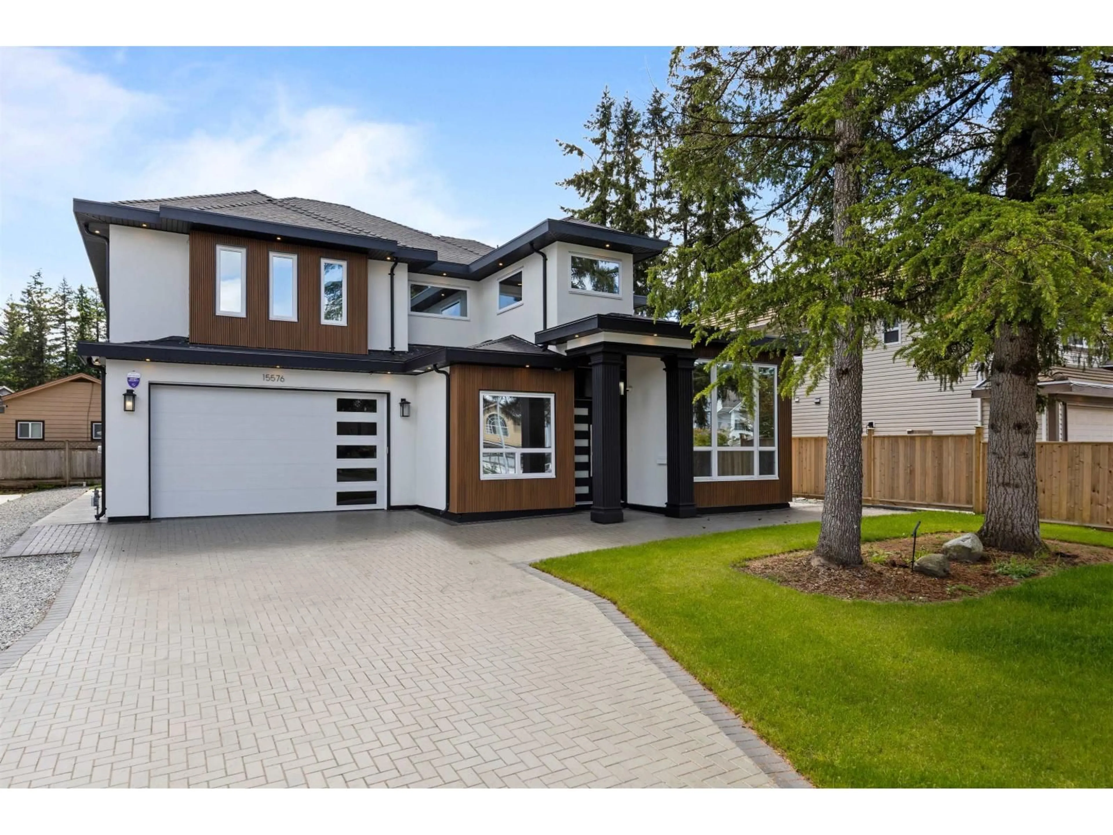 Home with brick exterior material, street for 15576 89B, Surrey British Columbia V3R4K9