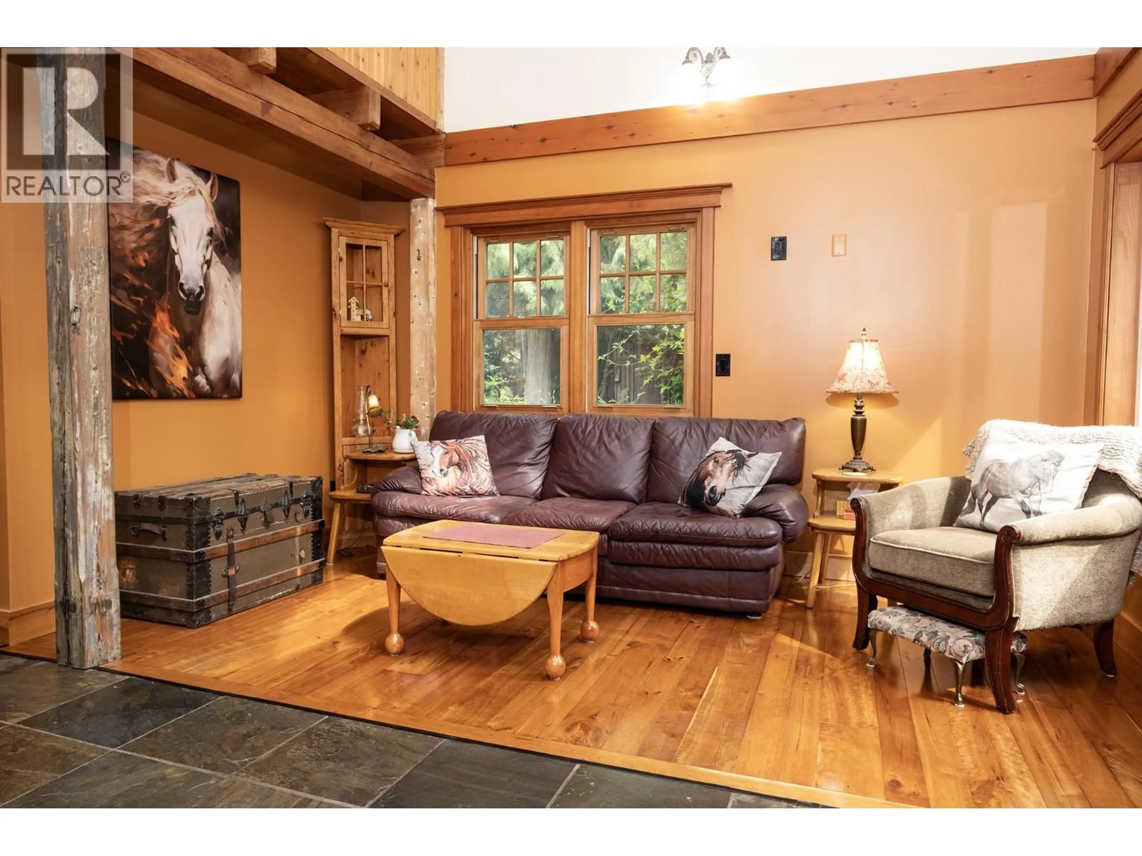 Living room with furniture, wood/laminate floor for 1760 PELL ROAD, Roberts Creek British Columbia V0N2W1