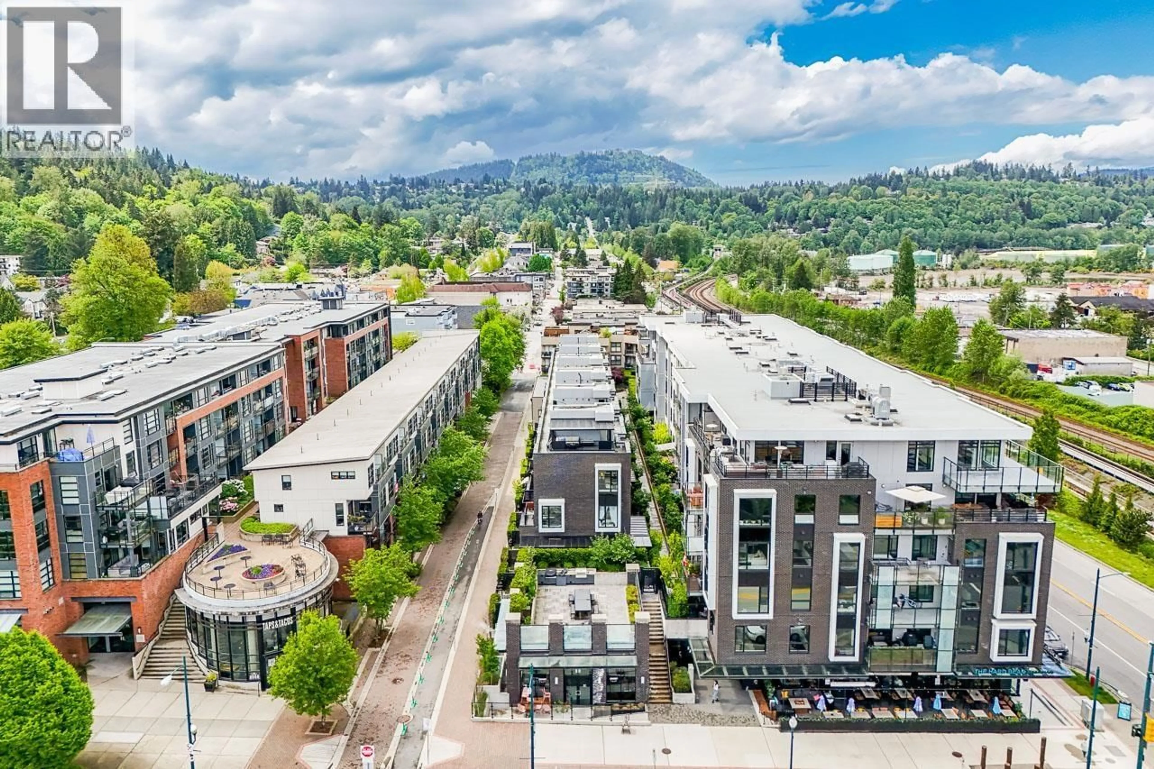 A pic from outside/outdoor area/front of a property/back of a property/a pic from drone, mountain view for 1 - 83 MOODY STREET, Port Moody British Columbia V3H0K7