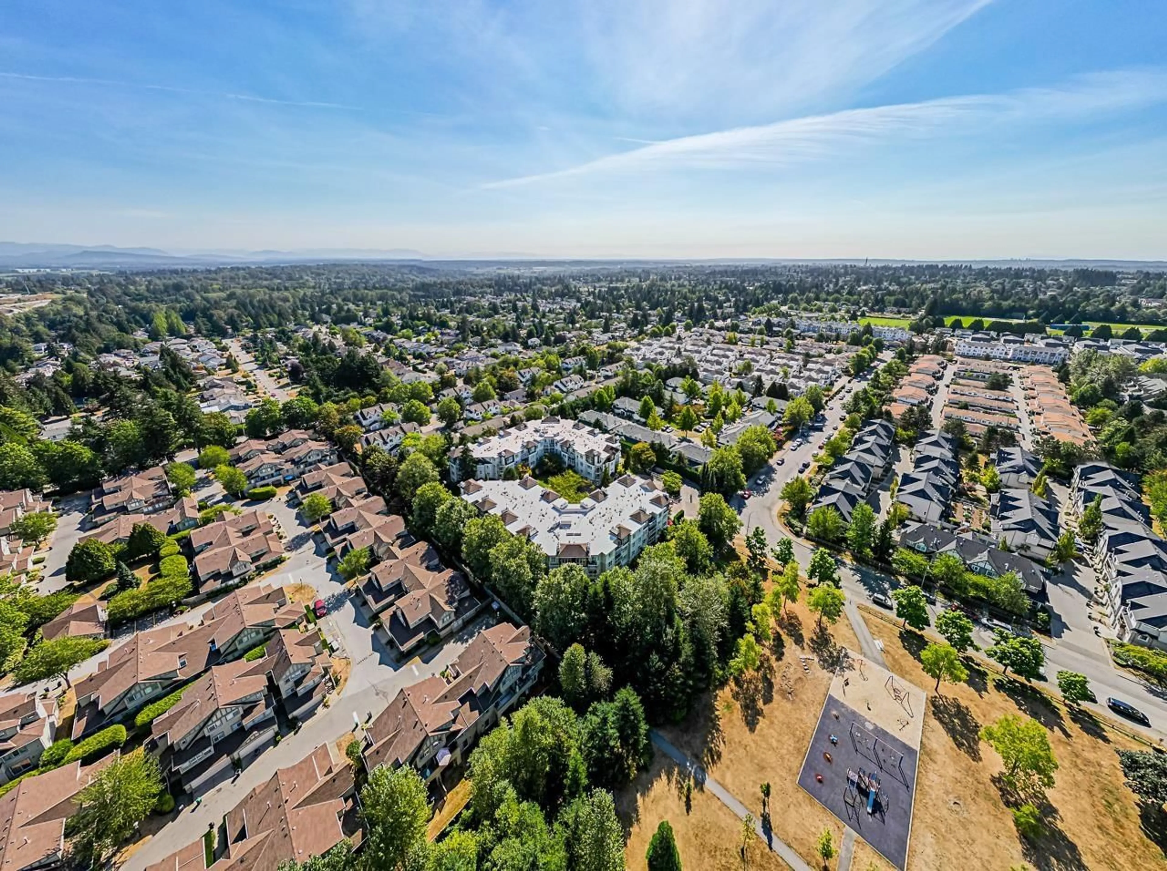 A pic from outside/outdoor area/front of a property/back of a property/a pic from drone, unknown for 403 - 10188 155, Surrey British Columbia V3R0R6