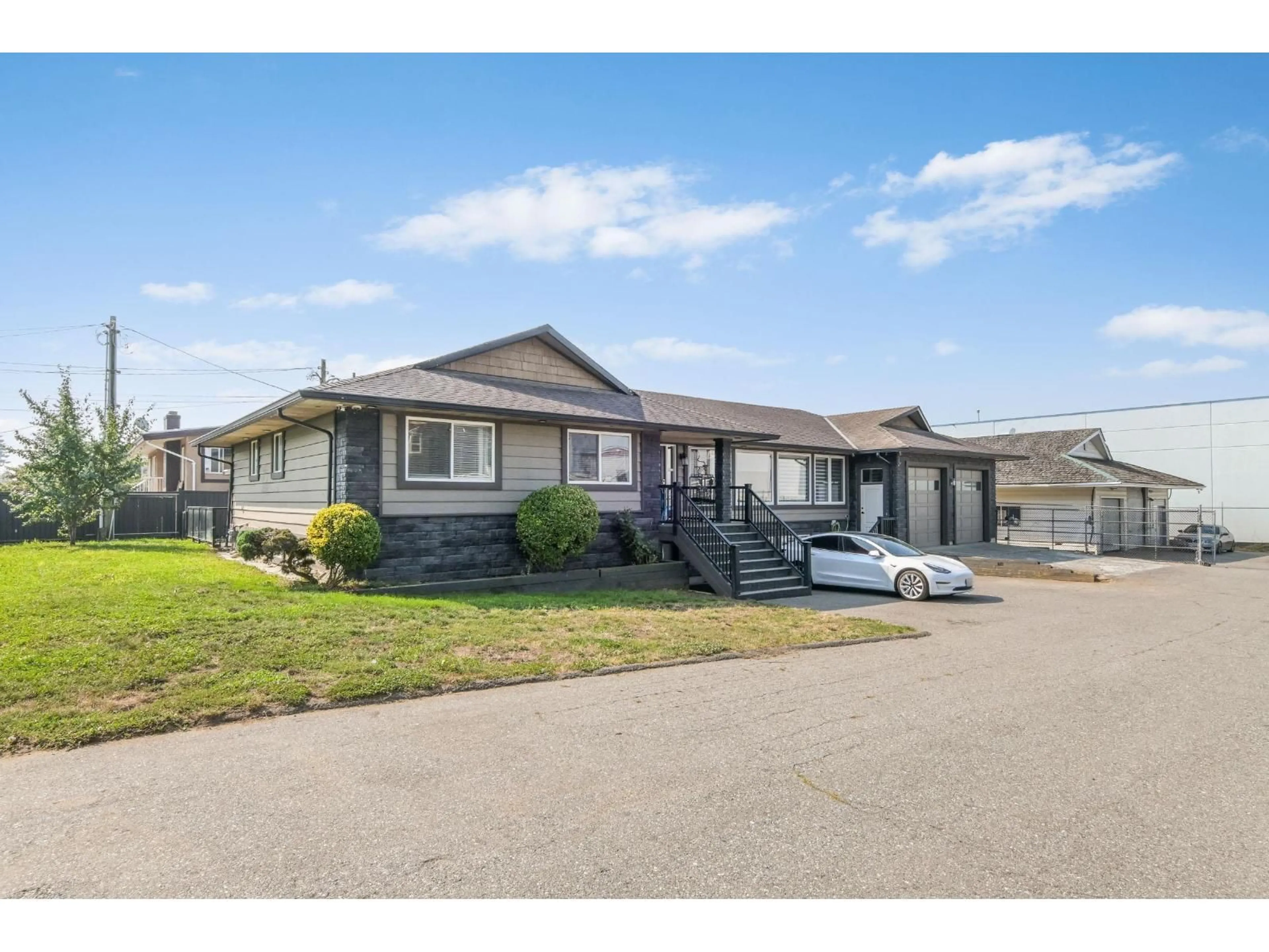 Home with vinyl exterior material, street for 2247 WINDSOR, Abbotsford British Columbia V2T6L8