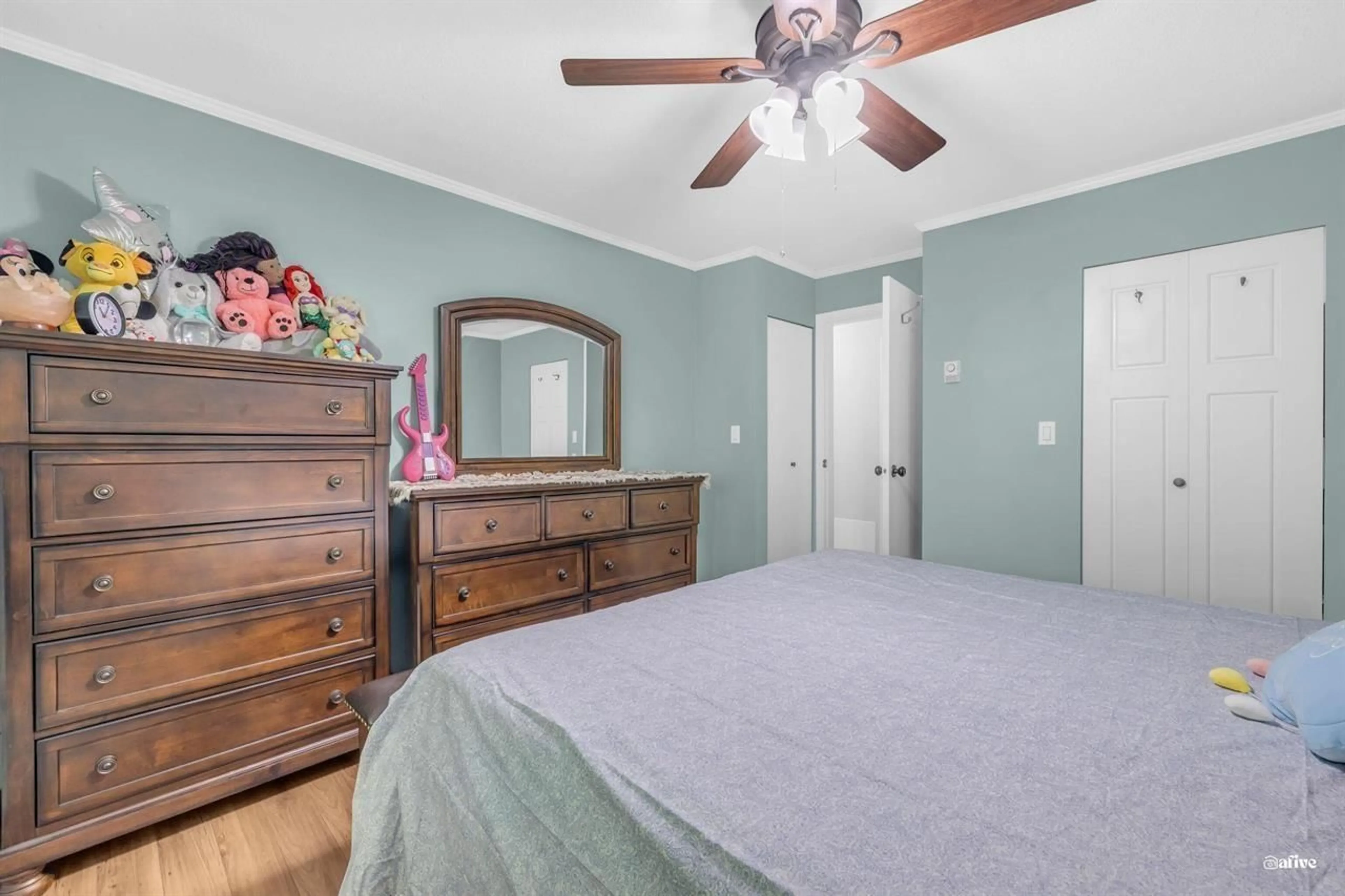 Bedroom with bed, wood/laminate floor for 202 - 1750 MCKENZIE, Abbotsford British Columbia V2S3Z3