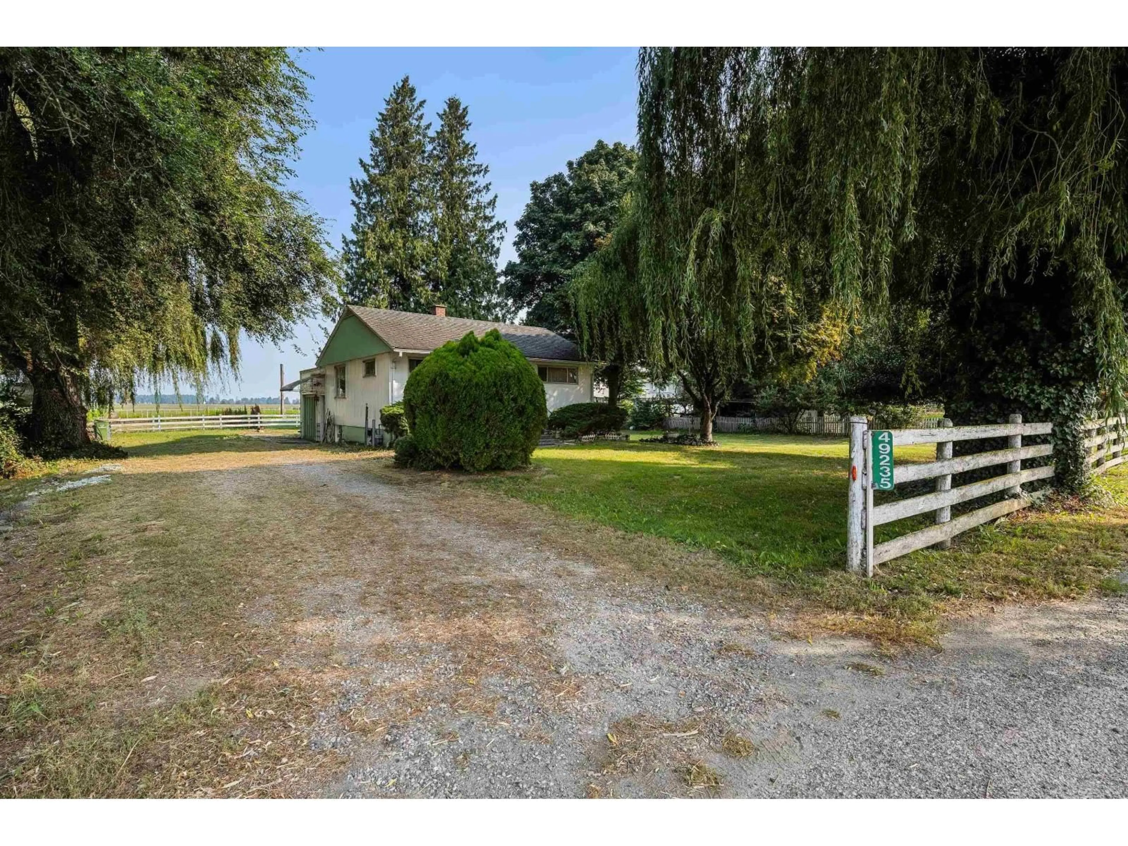 A pic from outside/outdoor area/front of a property/back of a property/a pic from drone, water/lake/river/ocean view for 49241 CHILLIWACK CENTRAL ROAD, Chilliwack British Columbia V2P6H3