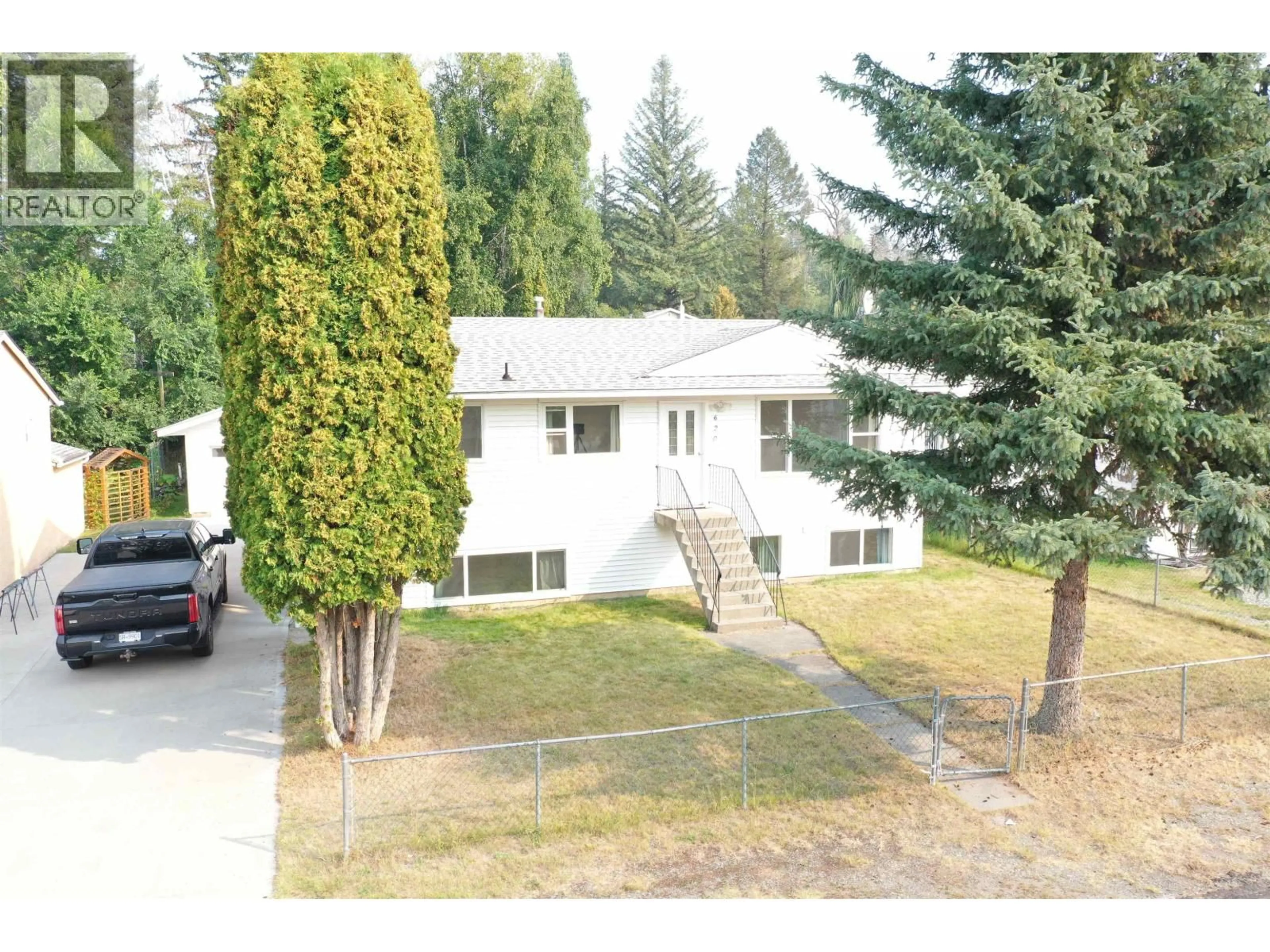 A pic from outside/outdoor area/front of a property/back of a property/a pic from drone, street for 620 HIGDON AVENUE, Quesnel British Columbia V2J1T1