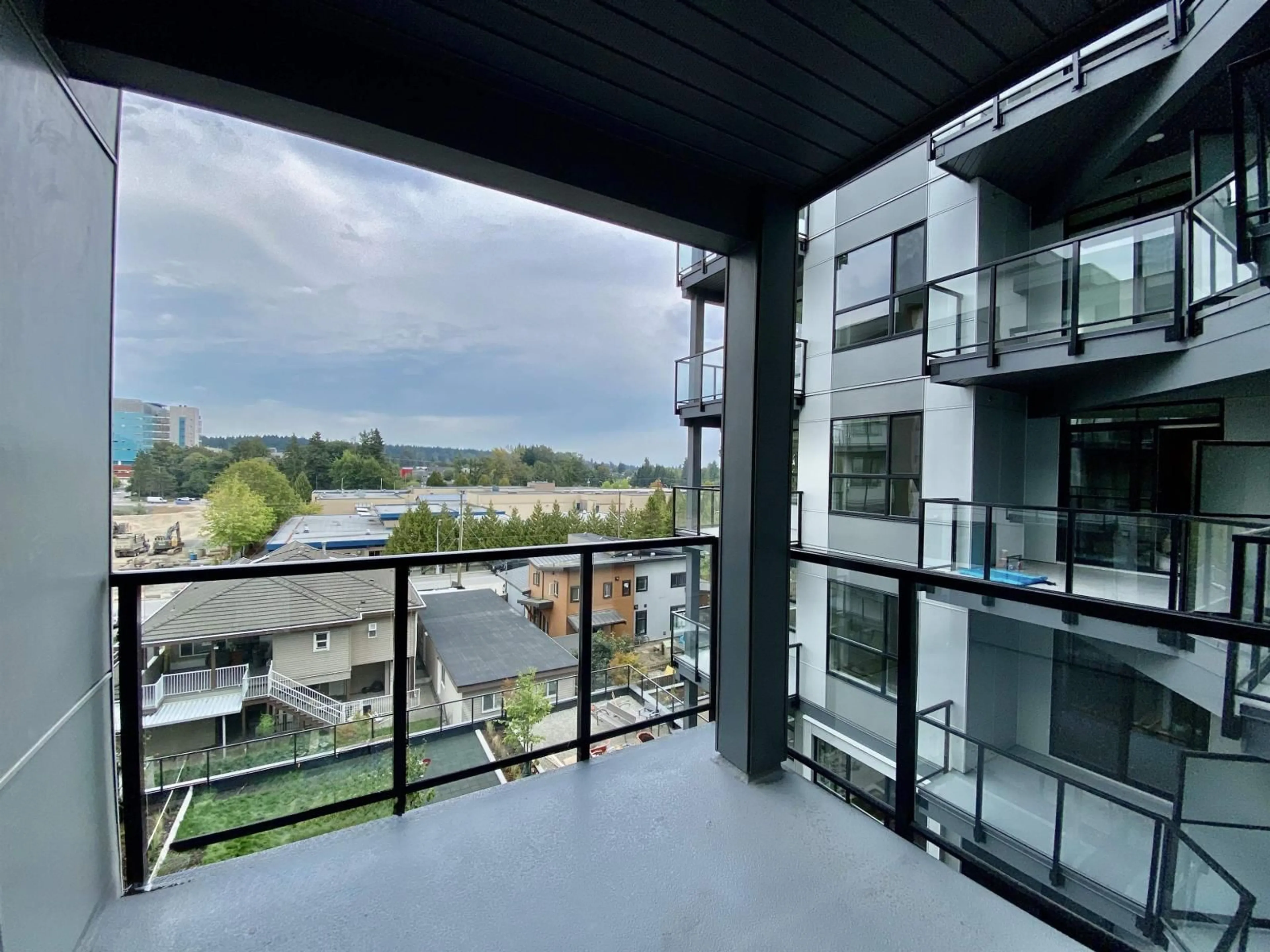 Balcony in the apartment, city buildings view from balcony for 401 - 13458 95, Surrey British Columbia V3V0H1