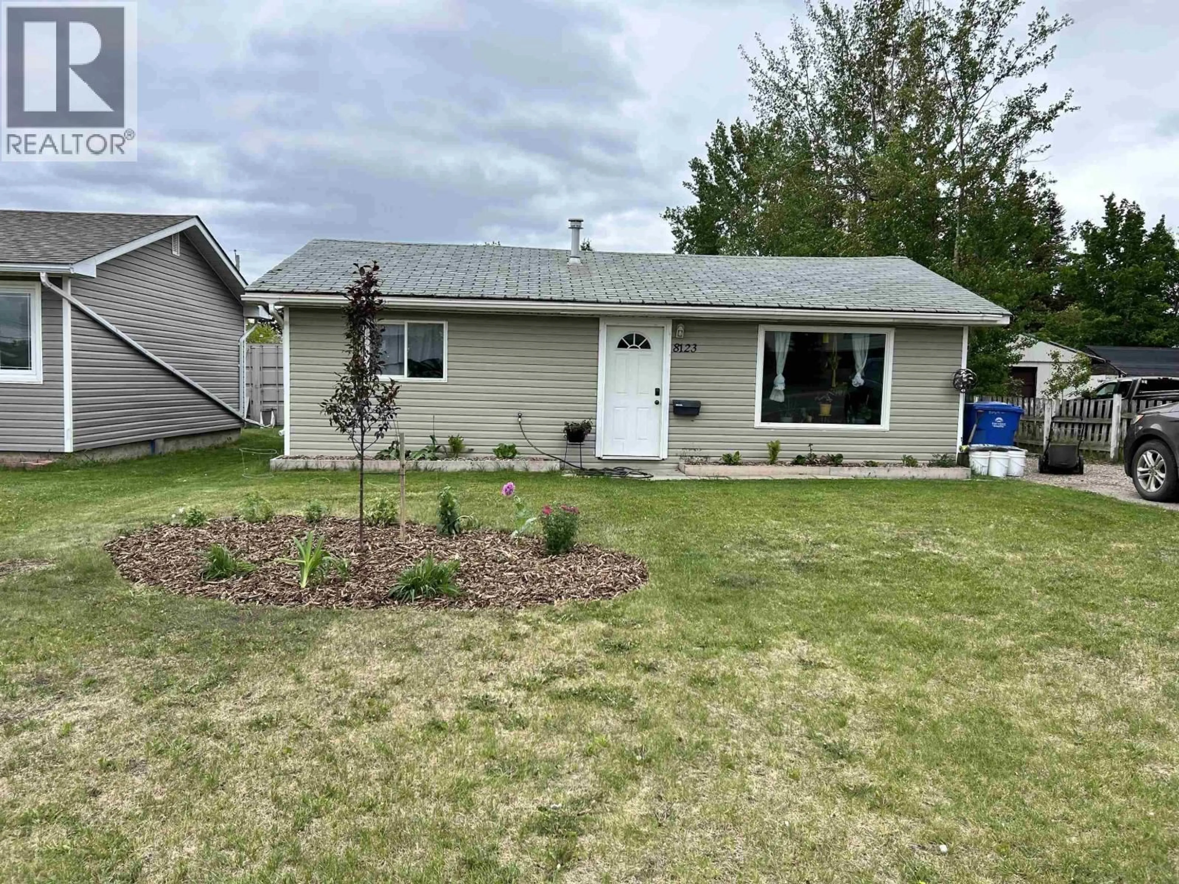 Home with vinyl exterior material, street for 8123 95 AVENUE, Fort St. John British Columbia V1J1G7