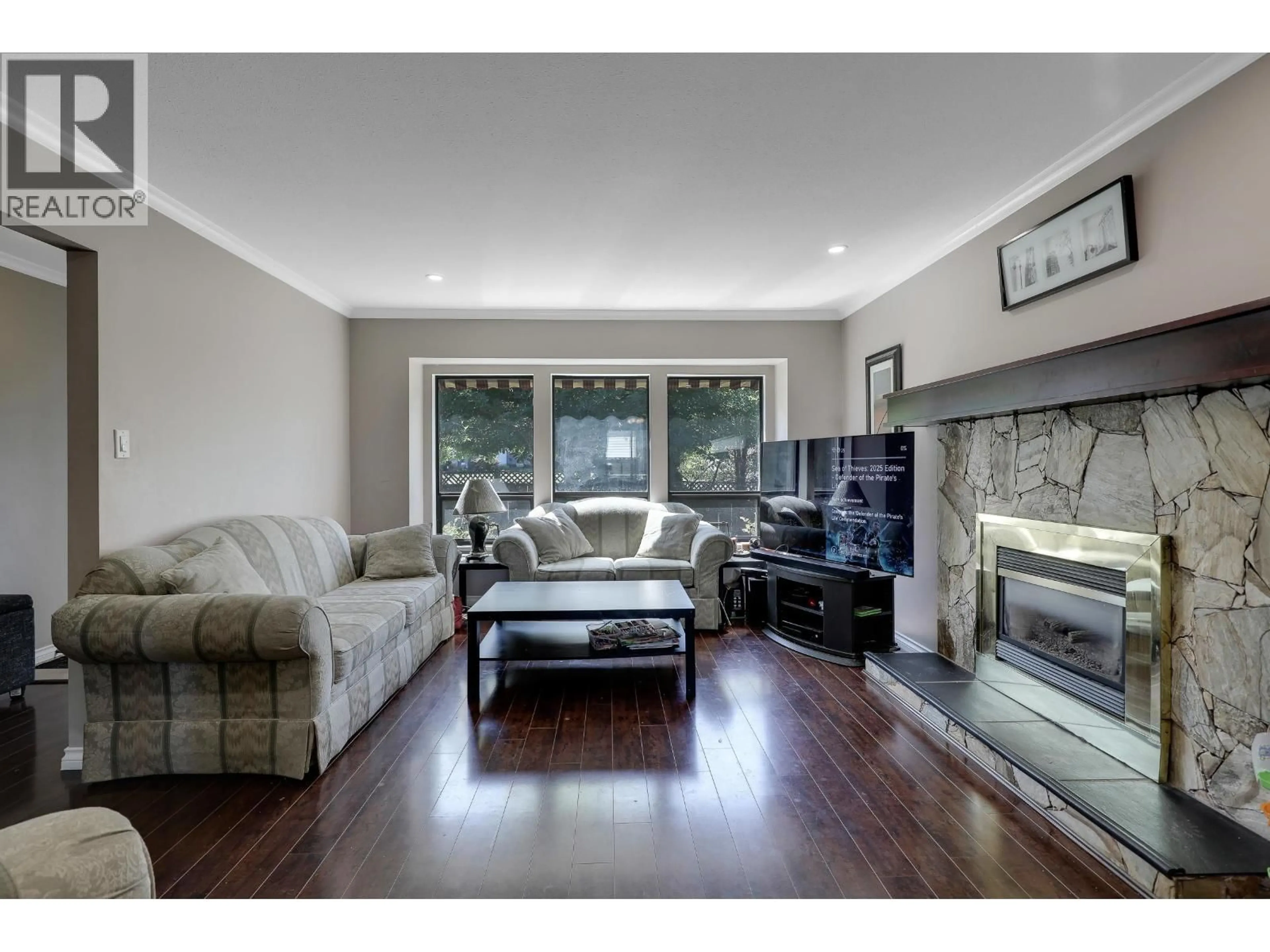 Living room with furniture, wood/laminate floor for 22705 124 AVENUE, Maple Ridge British Columbia V2X4K2