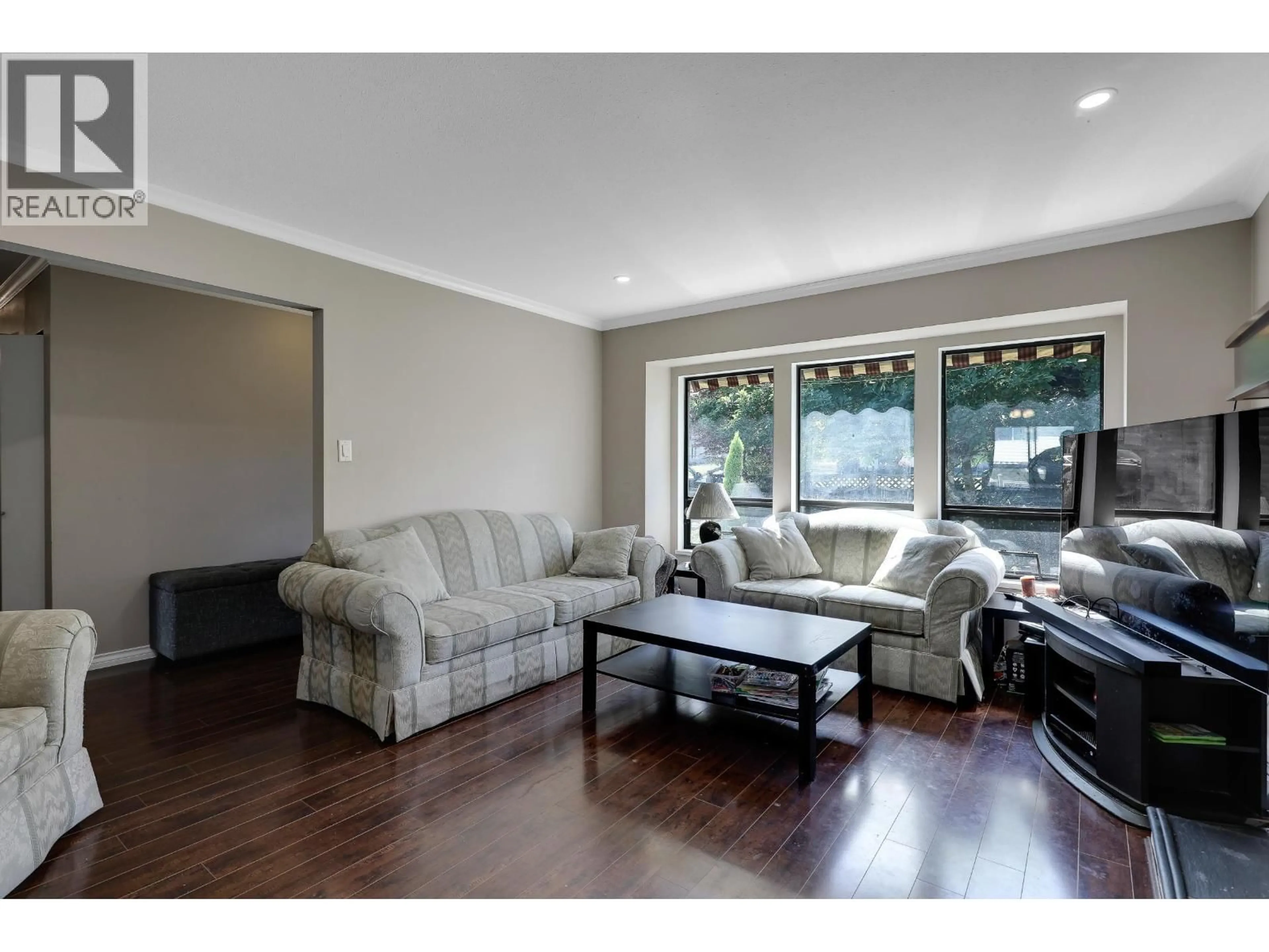 Living room with furniture, wood/laminate floor for 22705 124 AVENUE, Maple Ridge British Columbia V2X4K2