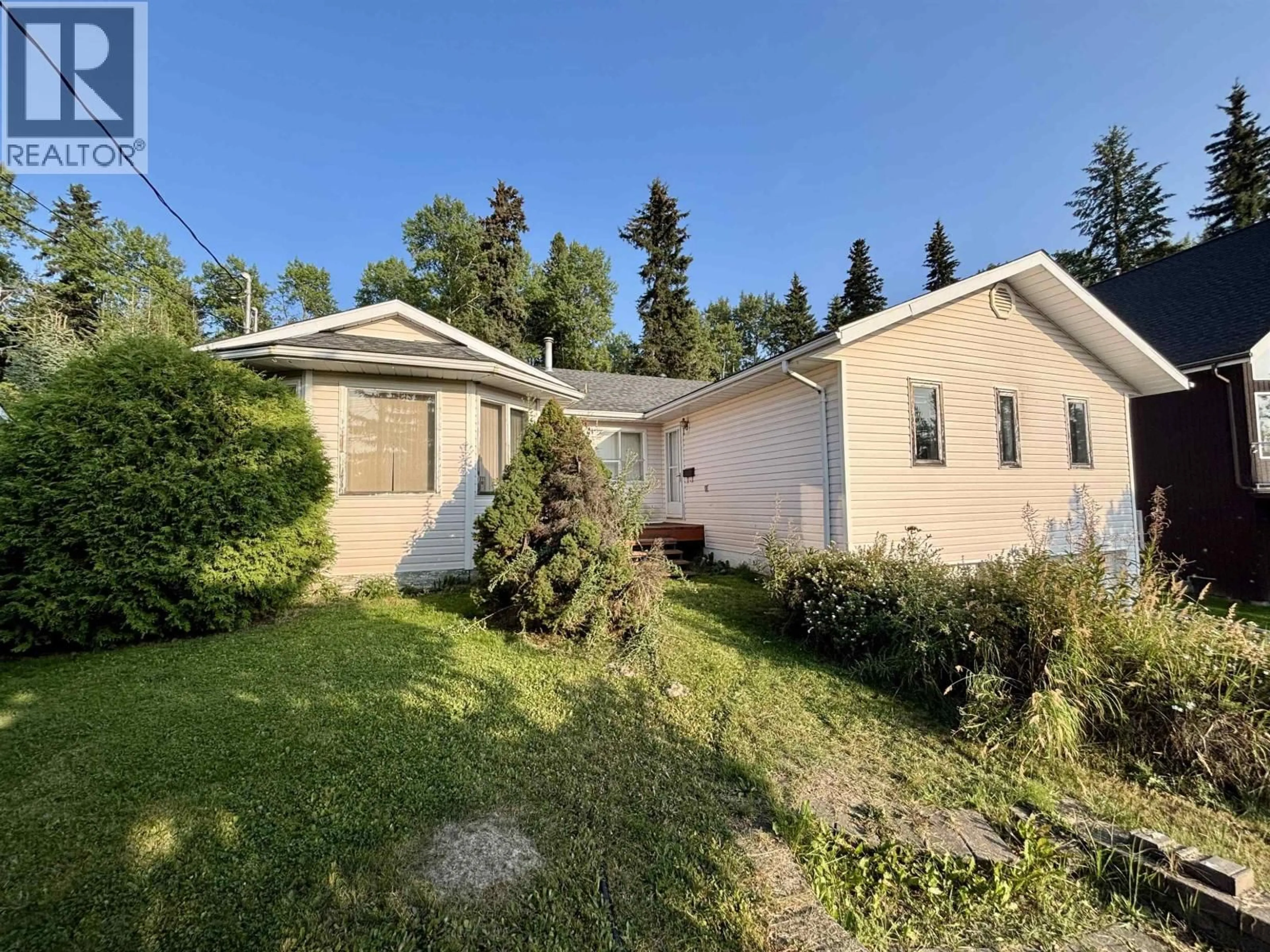 A pic from outside/outdoor area/front of a property/back of a property/a pic from drone, street for 7788 THOMPSON DRIVE, Prince George British Columbia V2N5N5