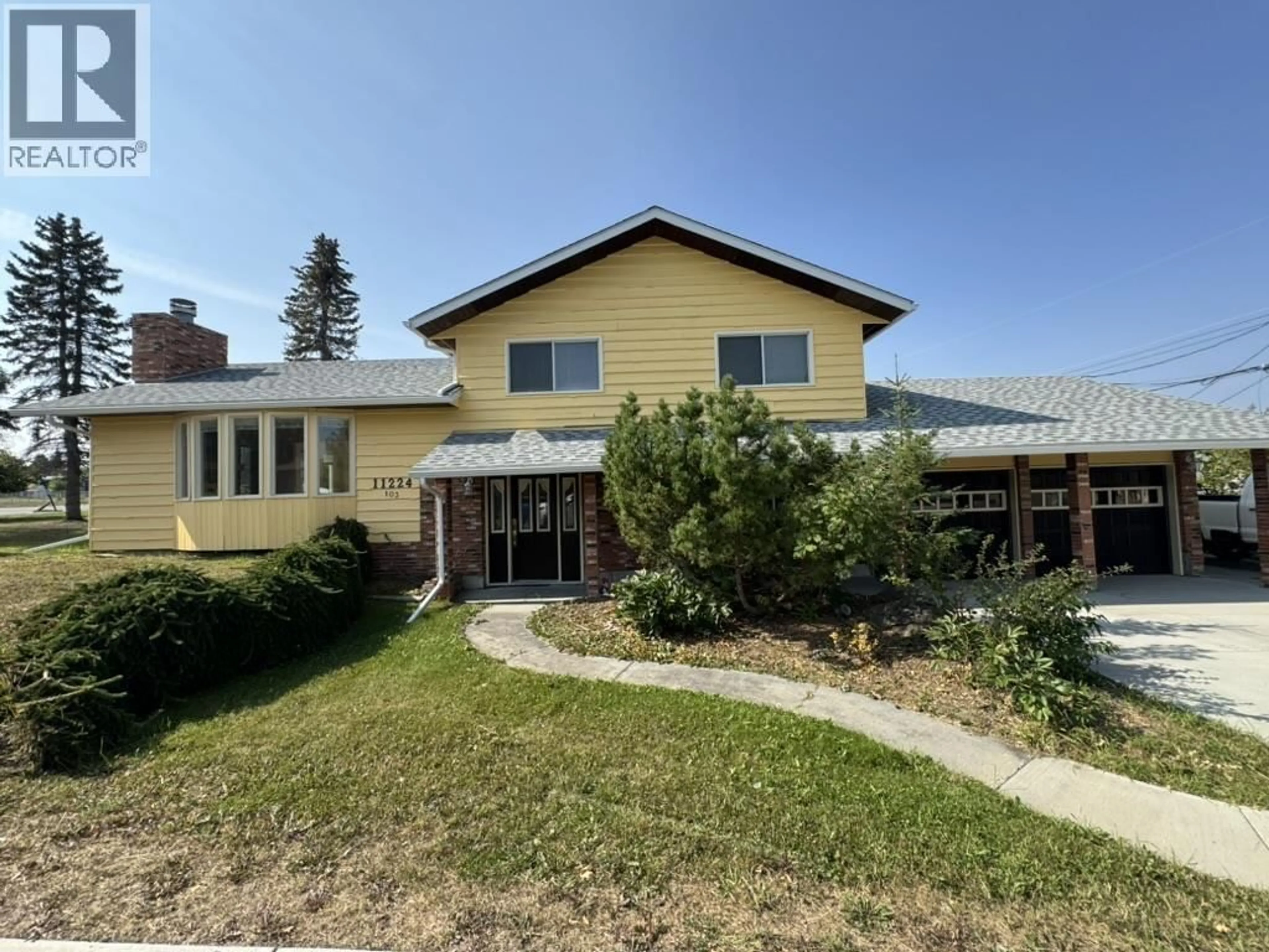A pic from outside/outdoor area/front of a property/back of a property/a pic from drone, unknown for 11224 103 STREET, Fort St. John British Columbia V1J5T2