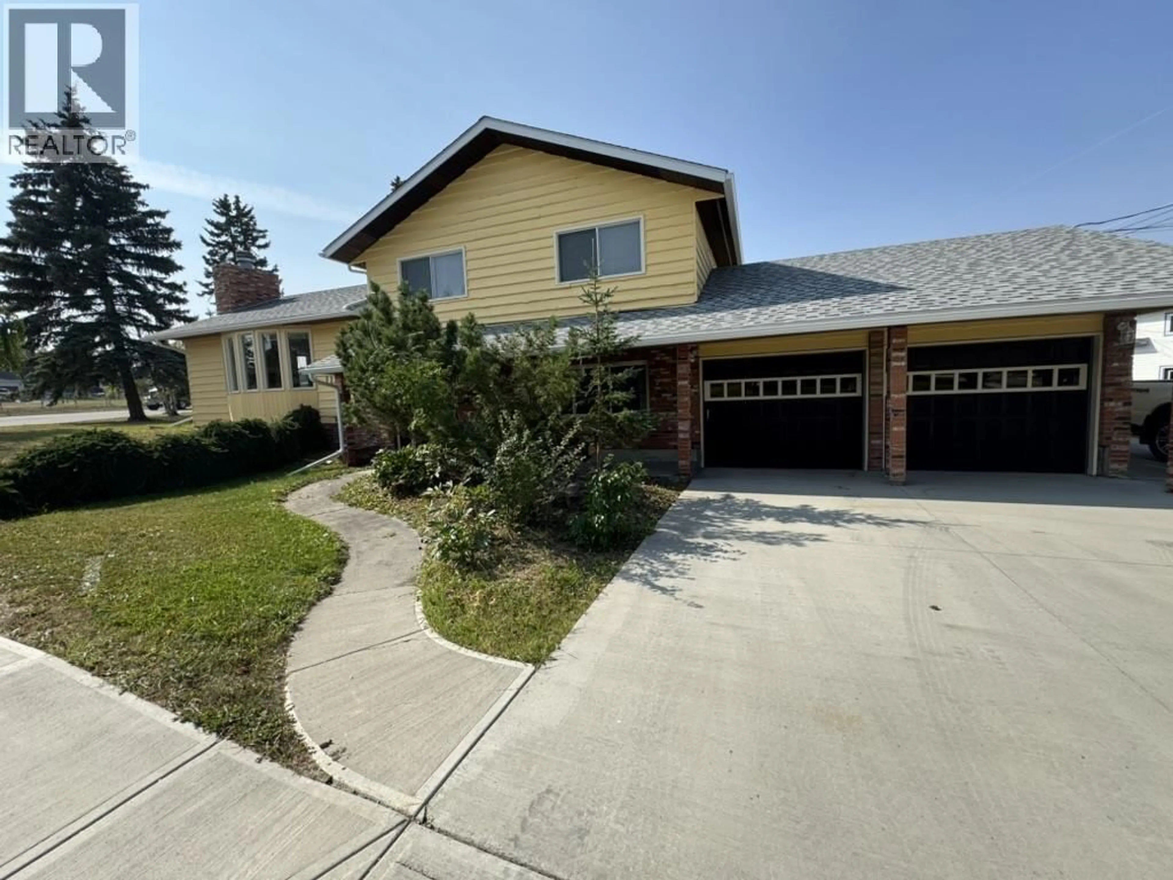 A pic from outside/outdoor area/front of a property/back of a property/a pic from drone, street for 11224 103 STREET, Fort St. John British Columbia V1J5T2