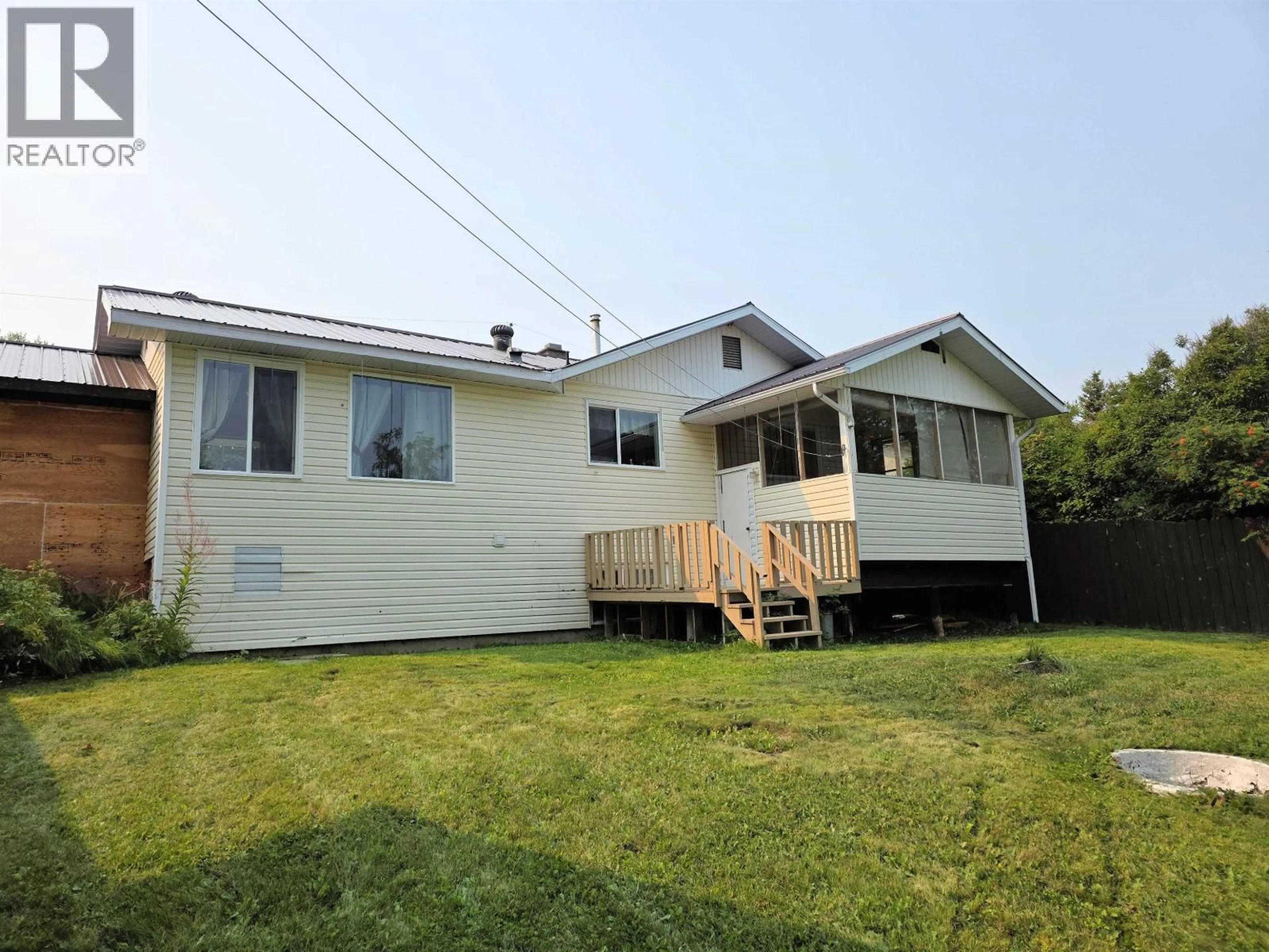 A pic from outside/outdoor area/front of a property/back of a property/a pic from drone, unknown for 41 FULTON STREET, Granisle British Columbia V0J1W0