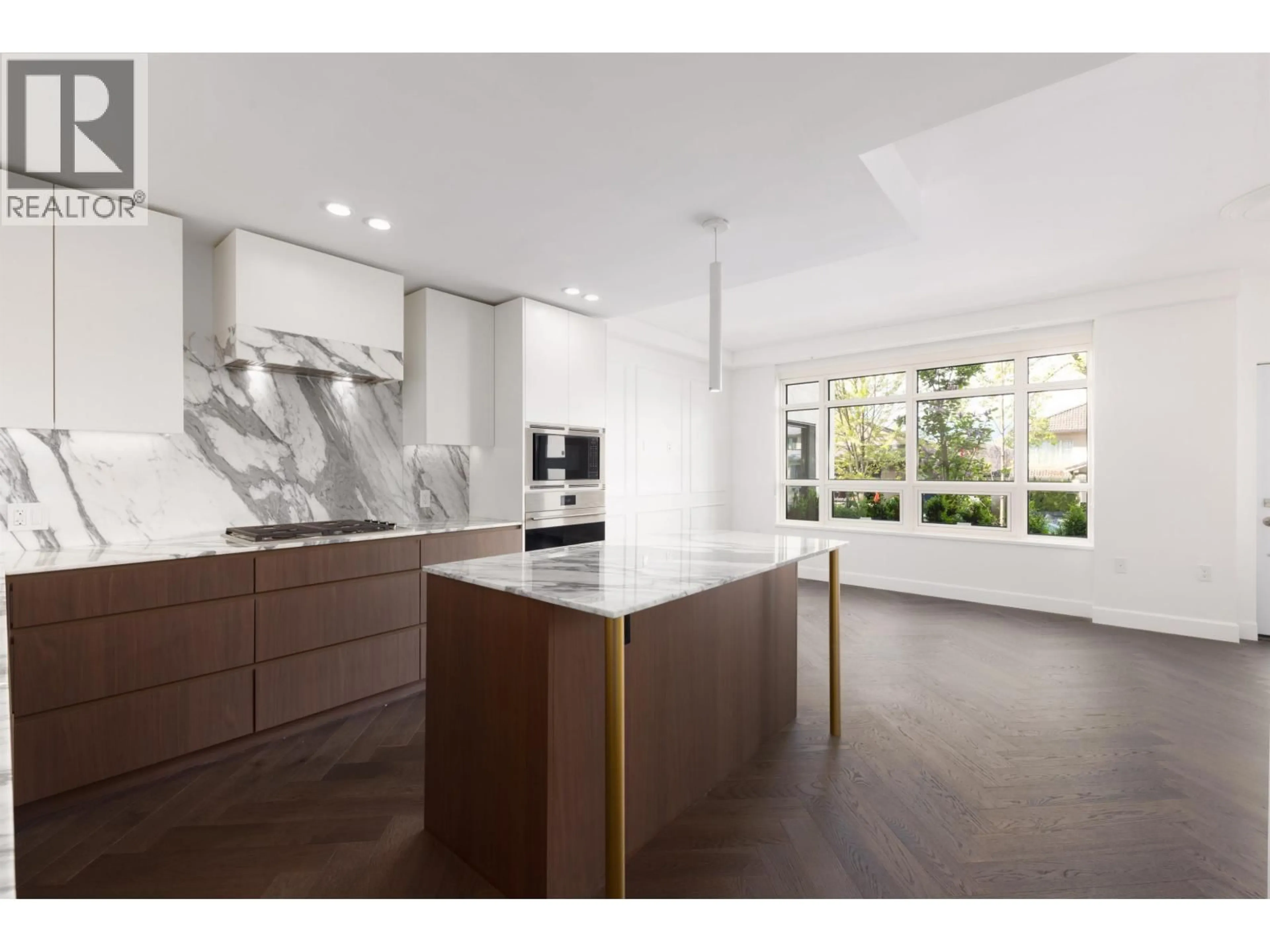 Open concept kitchen, ceramic/tile floor for 101 - 3668 10TH AVENUE, Vancouver British Columbia V6R0G4