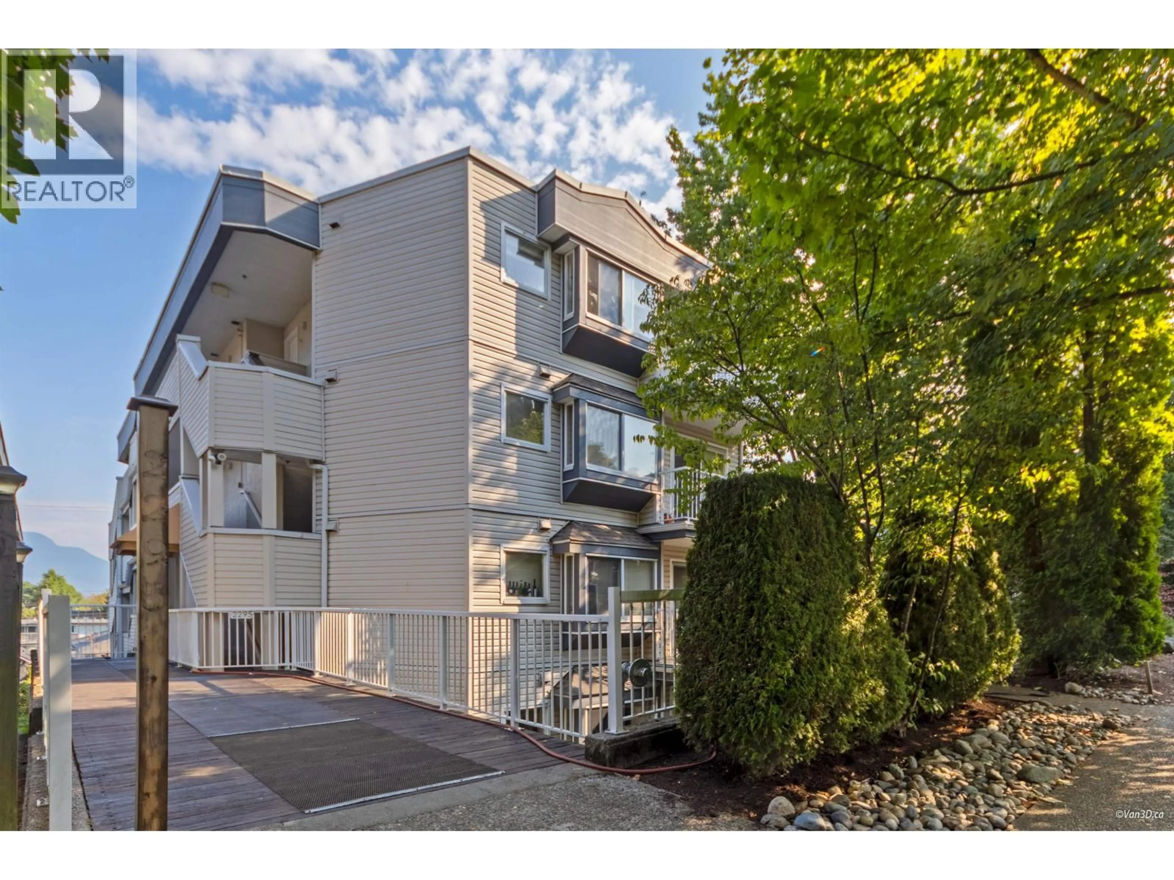 A pic from outside/outdoor area/front of a property/back of a property/a pic from drone, street for 202 - 2295 PANDORA STREET, Vancouver British Columbia V5L1N6