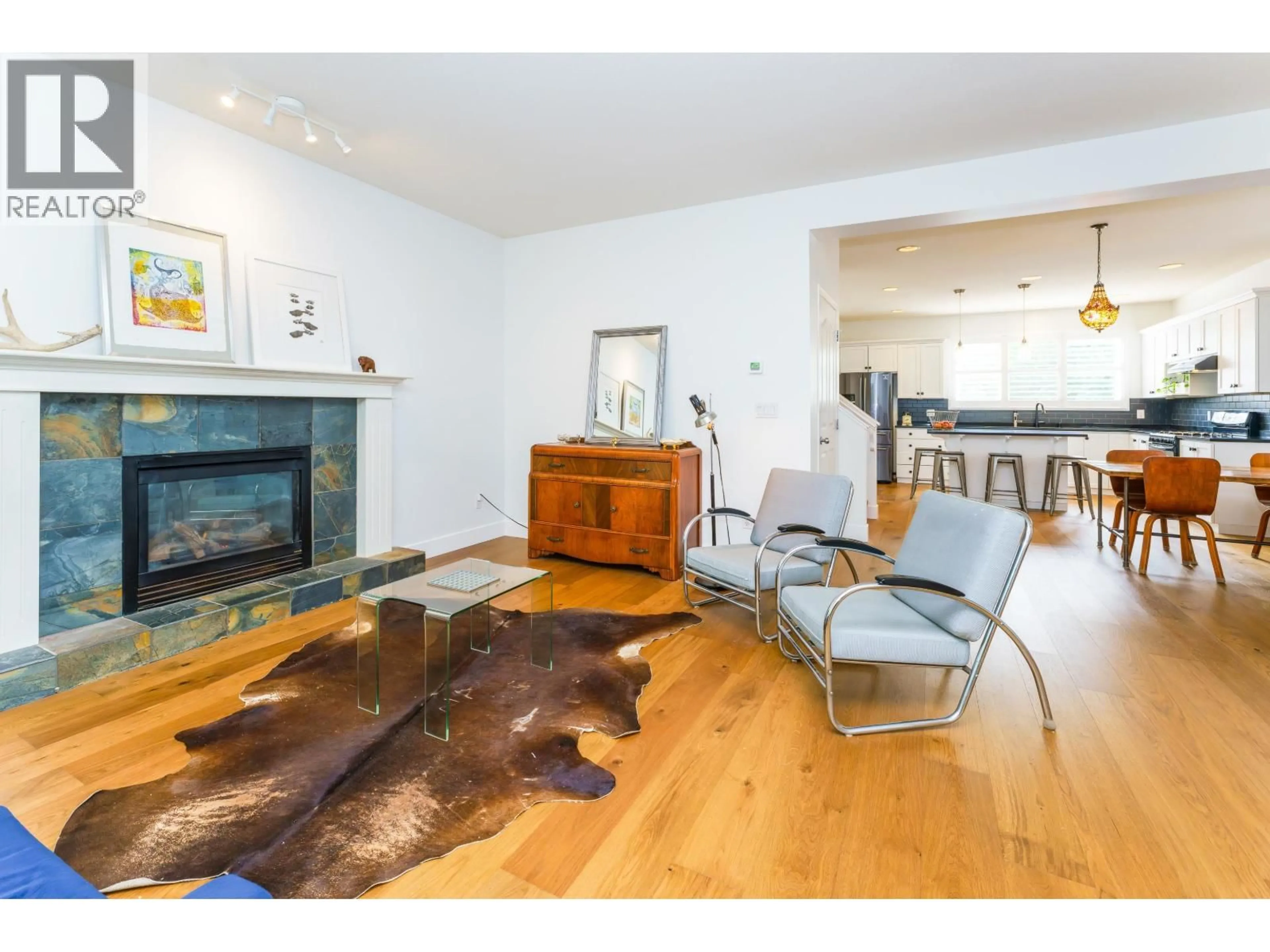 Living room with furniture, wood/laminate floor for 24254 103 AVENUE, Maple Ridge British Columbia V2W1Y1