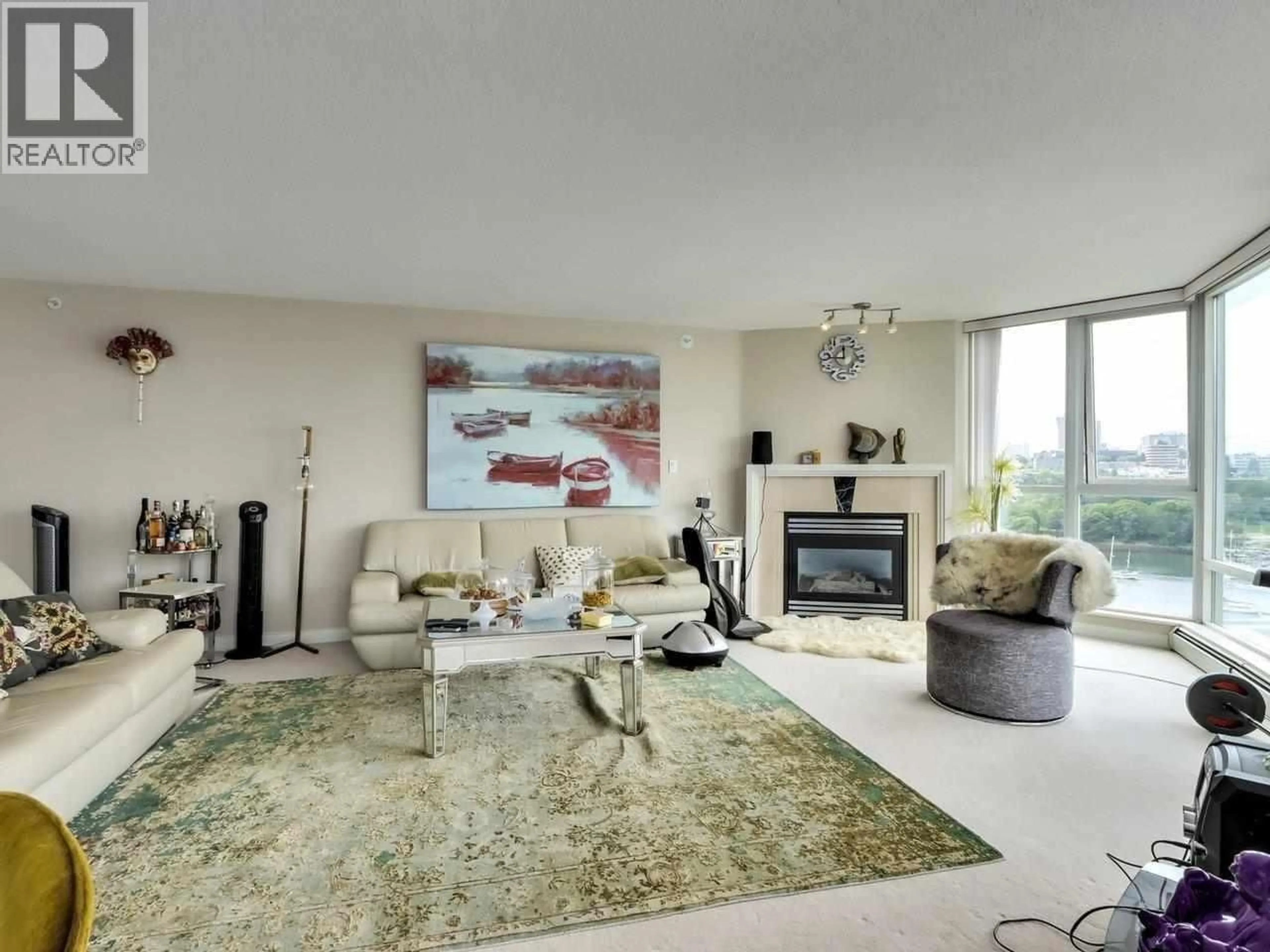 Living room with furniture, carpet floor for 1601 - 1383 MARINASIDE CRESCENT, Vancouver British Columbia V6Z2W9