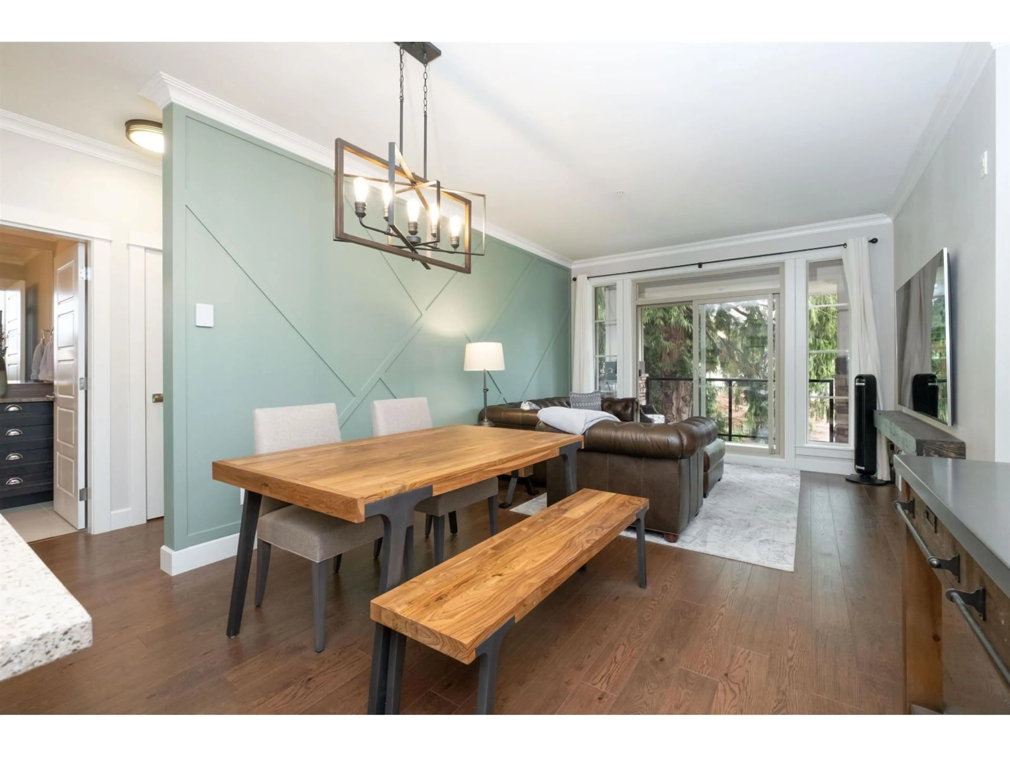 Dining room, wood/laminate floor for 203 - 15145 36, Surrey British Columbia V3Z4R3
