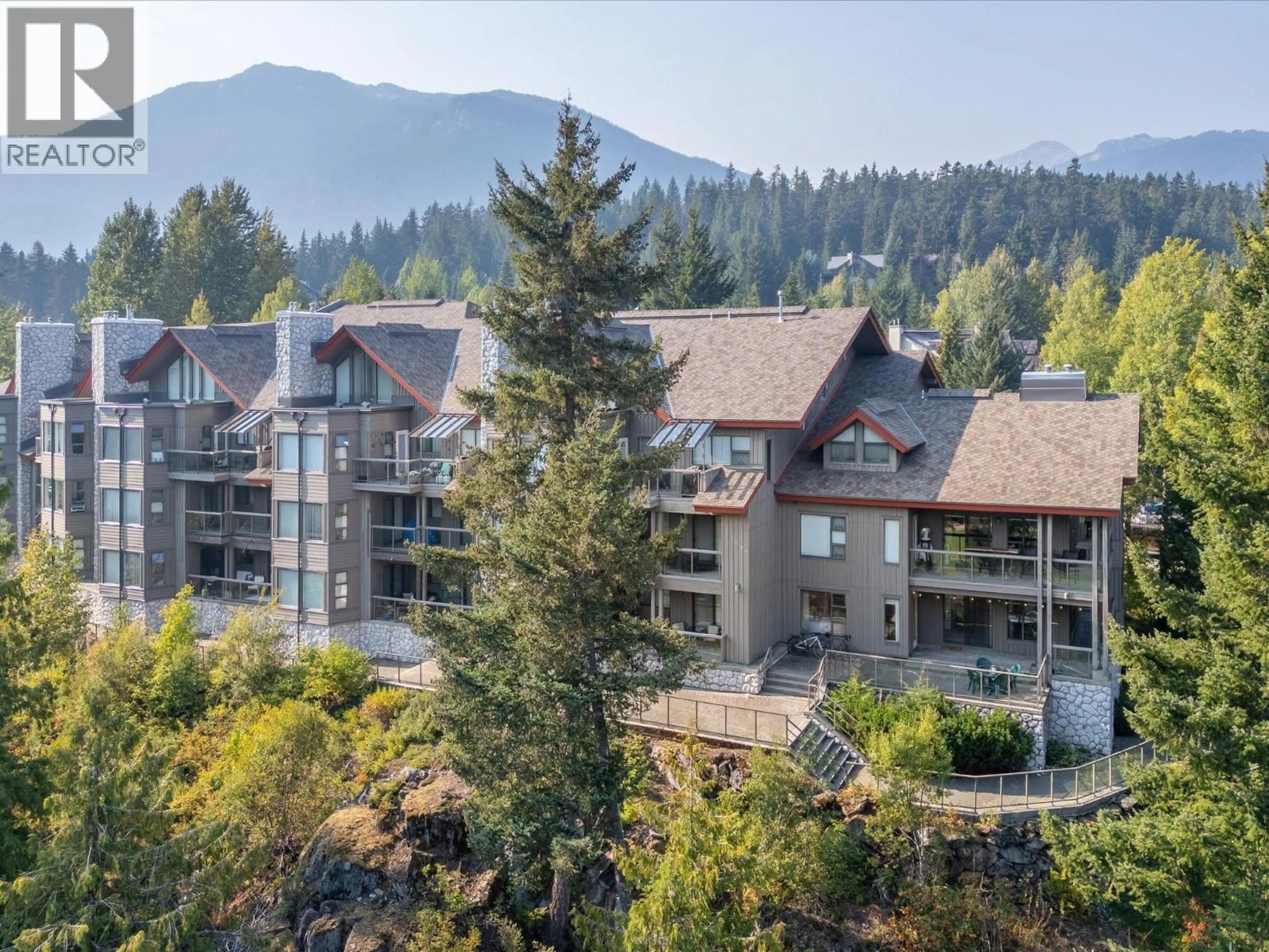 A pic from outside/outdoor area/front of a property/back of a property/a pic from drone, mountain view for 129 - 3309 PTARMIGAN PLACE, Whistler British Columbia V8E0V6