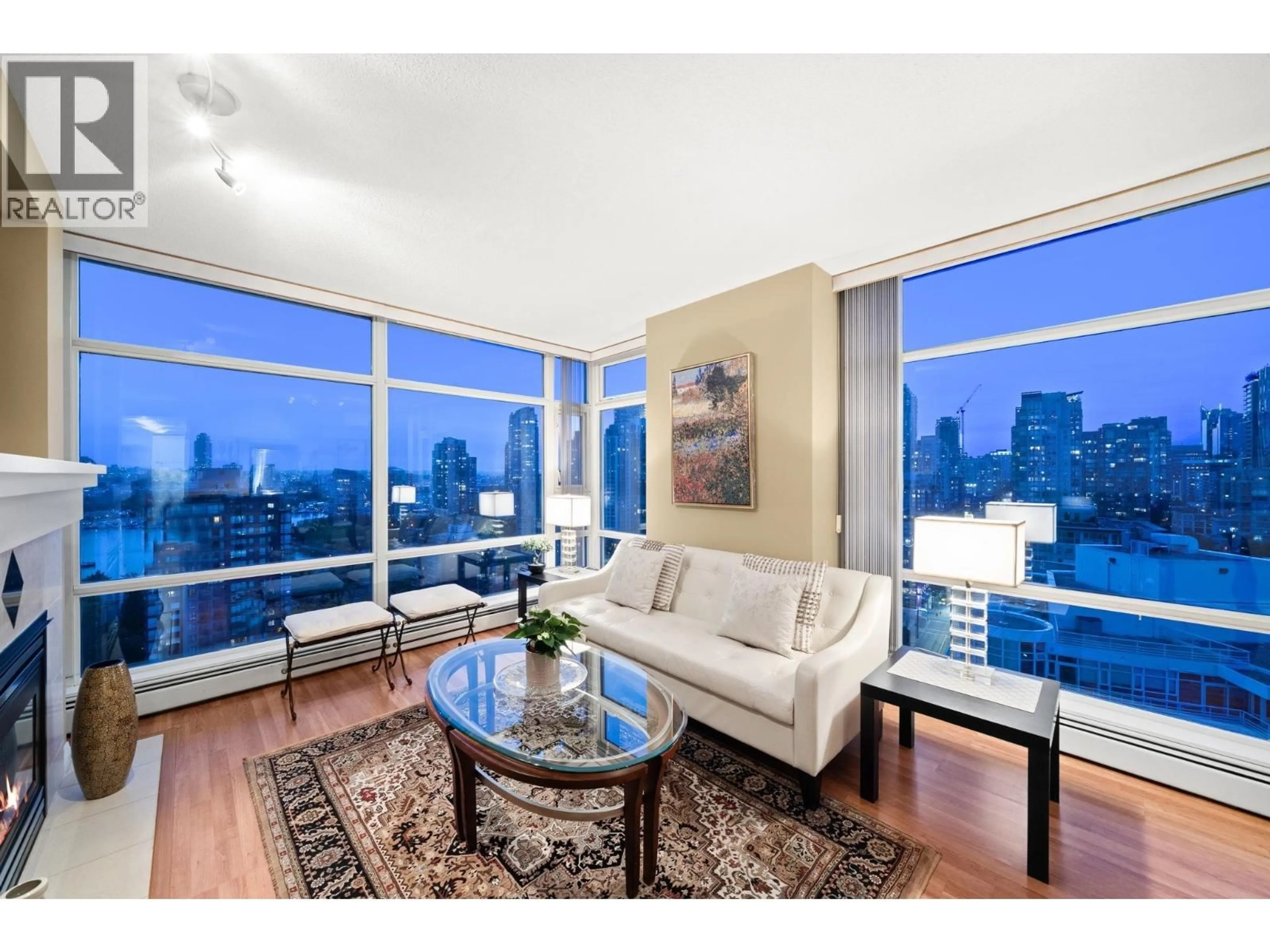 Living room with furniture, wood/laminate floor for 2306 - 1199 MARINASIDE CRESCENT, Vancouver British Columbia V6Z2Y2