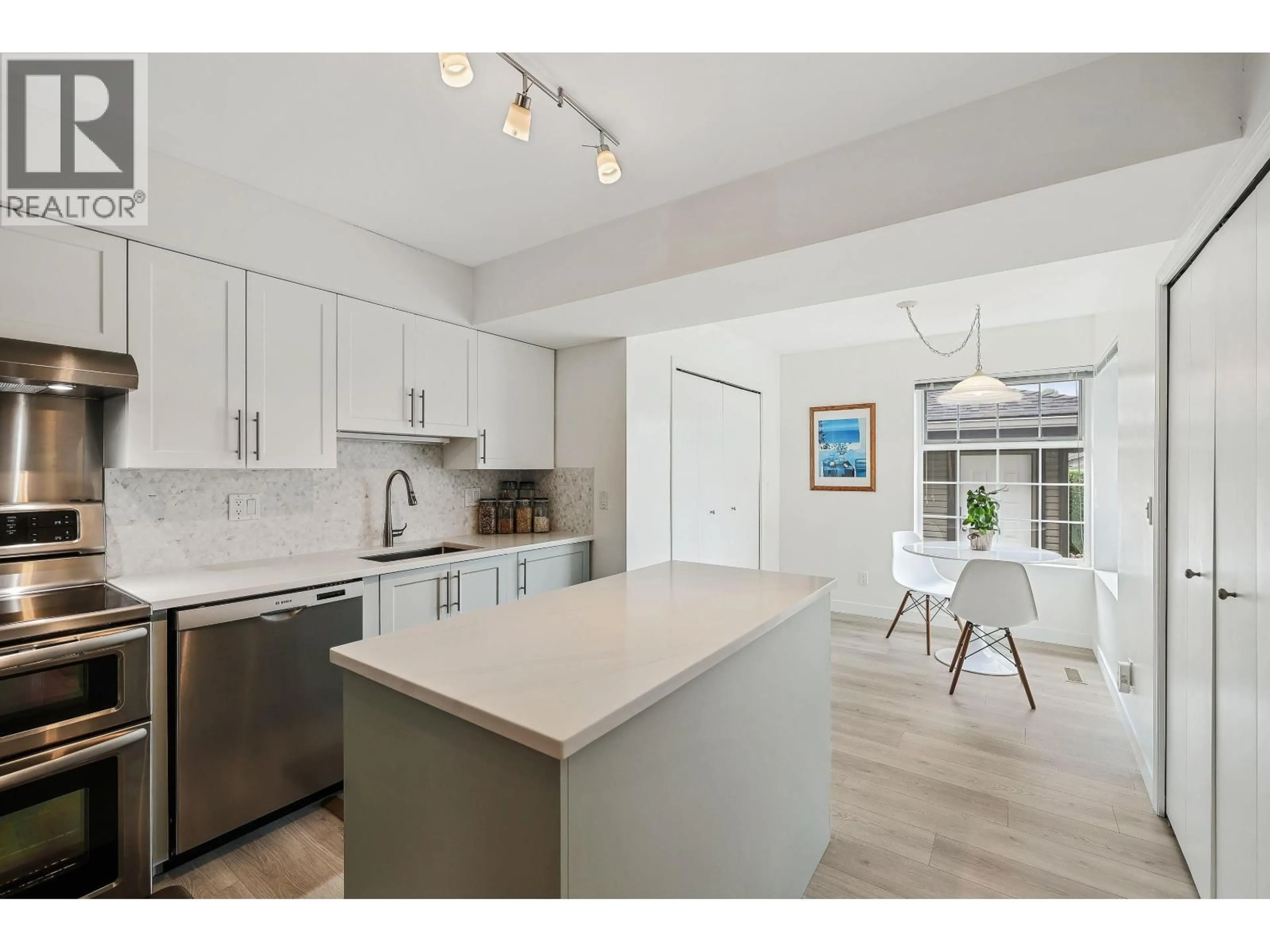 Open concept kitchen, unknown for 106 - 1140 CASTLE CRESCENT, Port Coquitlam British Columbia V3C5M3